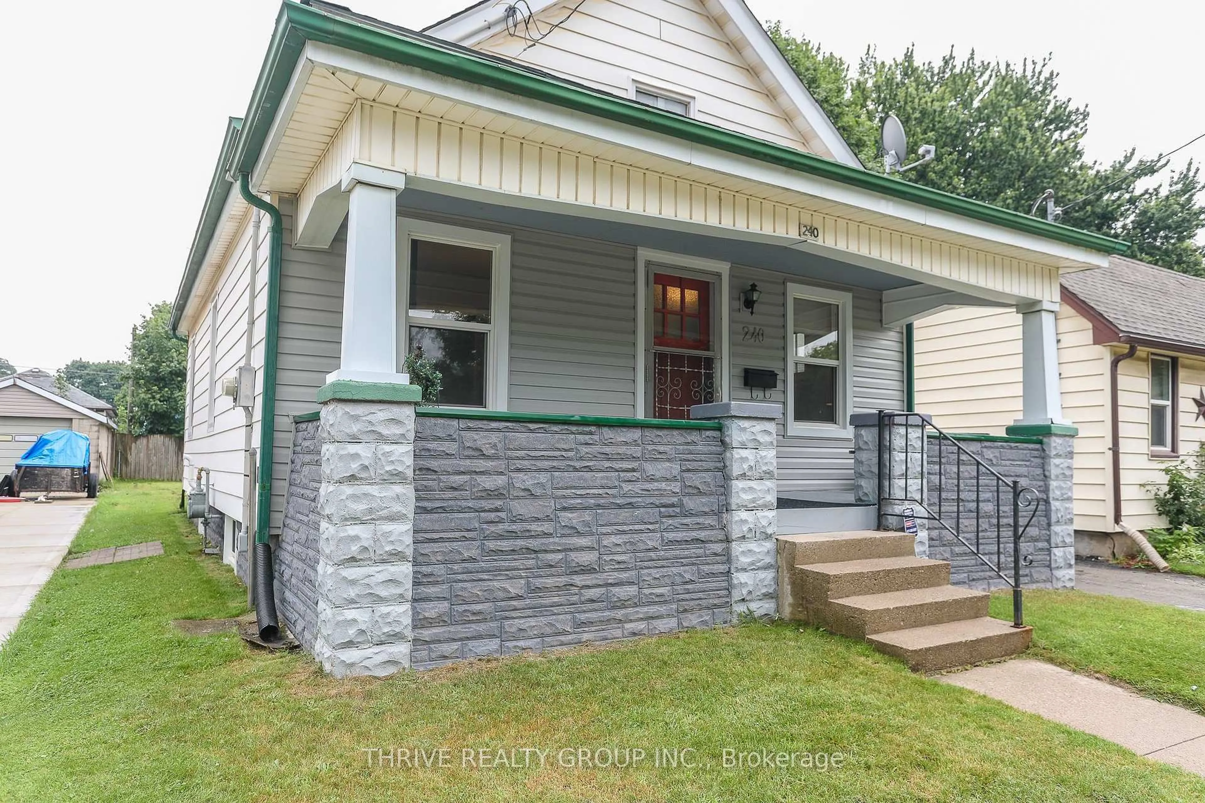 Home with vinyl exterior material, street for 240 East St, London East Ontario N5Z 2S2