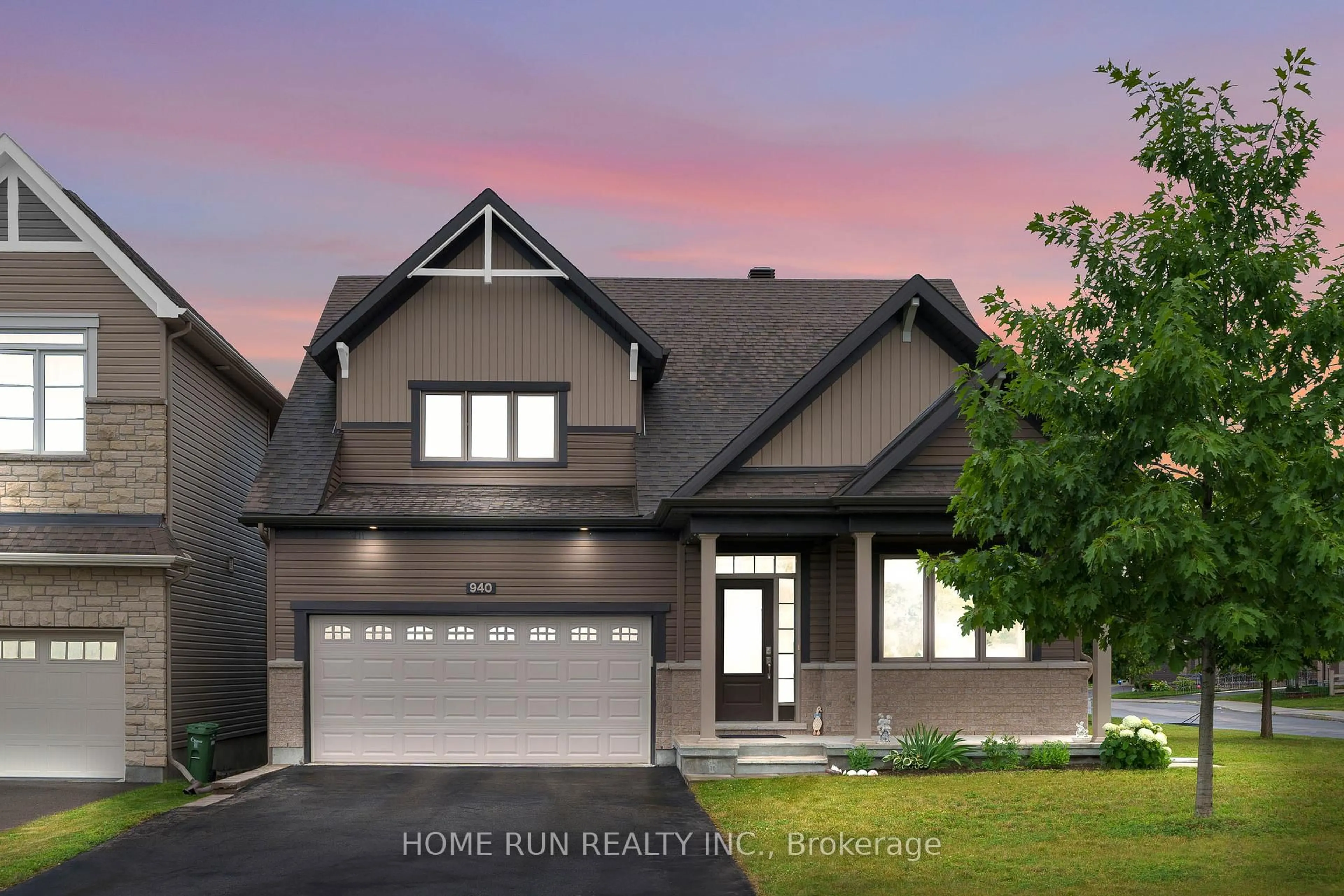 Home with vinyl exterior material, street for 940 Guinness Cres, Ottawa Ontario K2J 6G8
