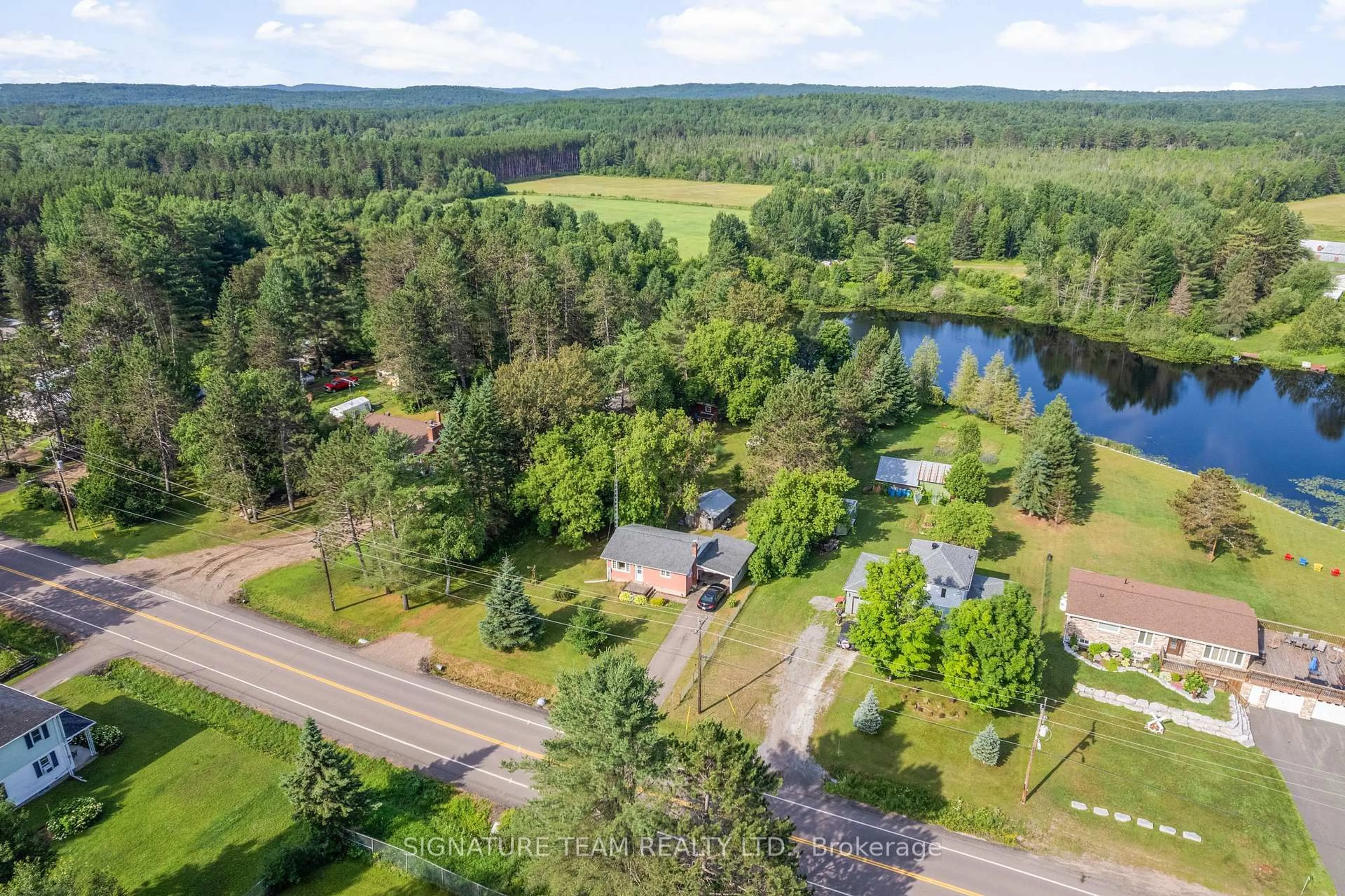 A pic from outside/outdoor area/front of a property/back of a property/a pic from drone, water/lake/river/ocean view for 2441 Simpson Pit Rd, Round Lake Centre Ontario K0J 2J0