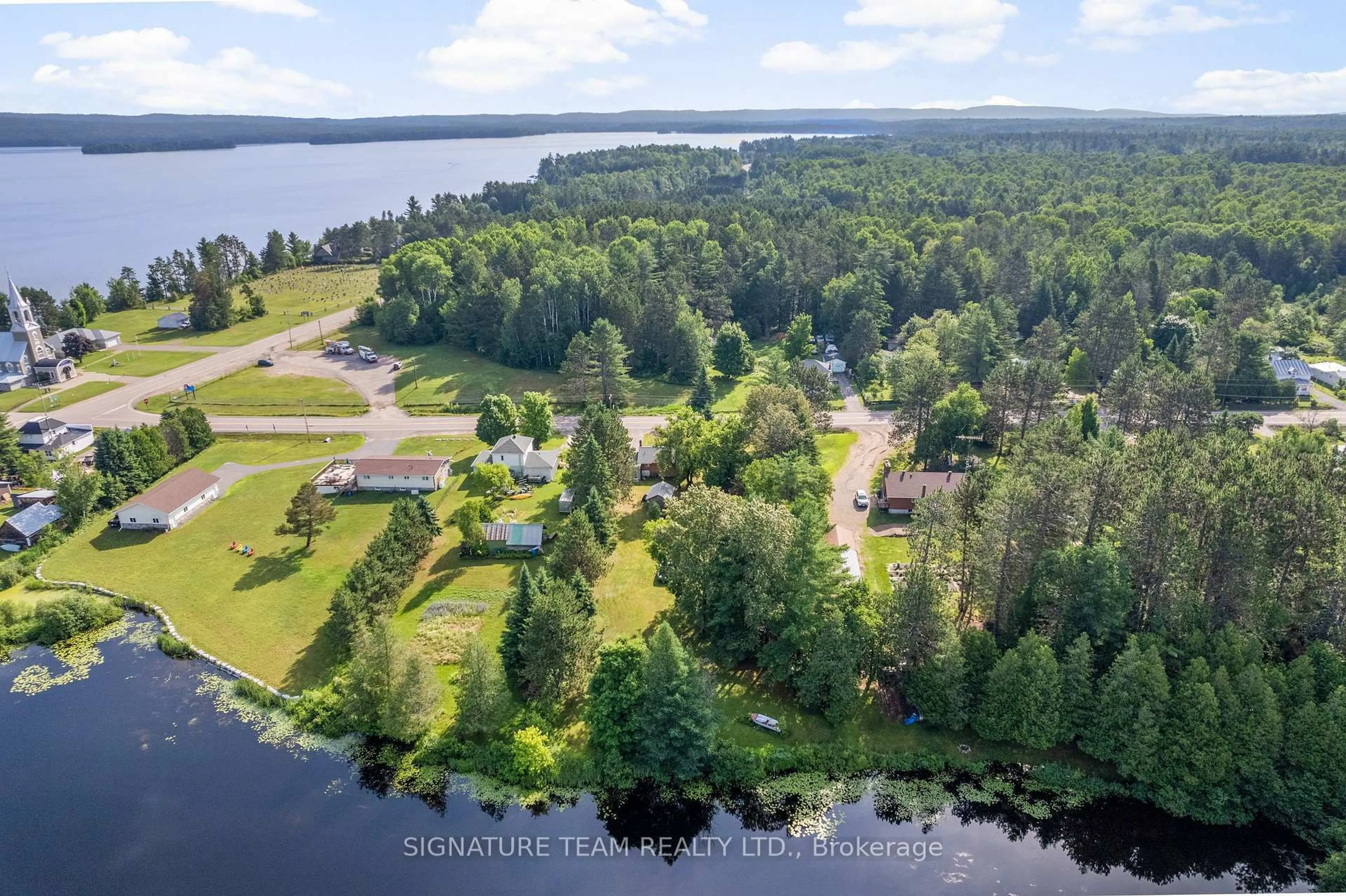 A pic from outside/outdoor area/front of a property/back of a property/a pic from drone, water/lake/river/ocean view for 2441 Simpson Pit Rd, Round Lake Centre Ontario K0J 2J0