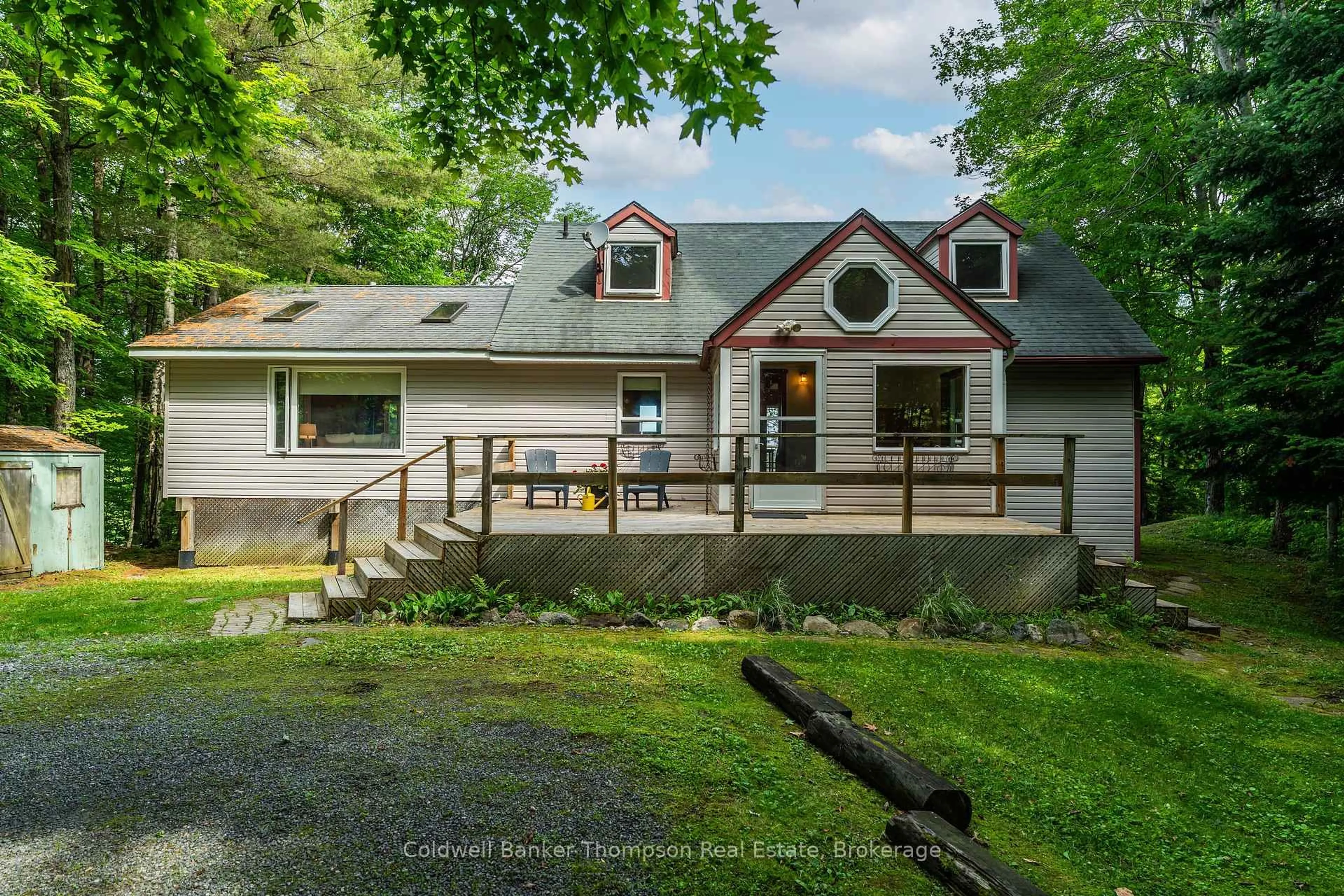 A pic from outside/outdoor area/front of a property/back of a property/a pic from drone, unknown for 1090 Muskoka #10 Rd, Huntsville Ontario P0B 1L0