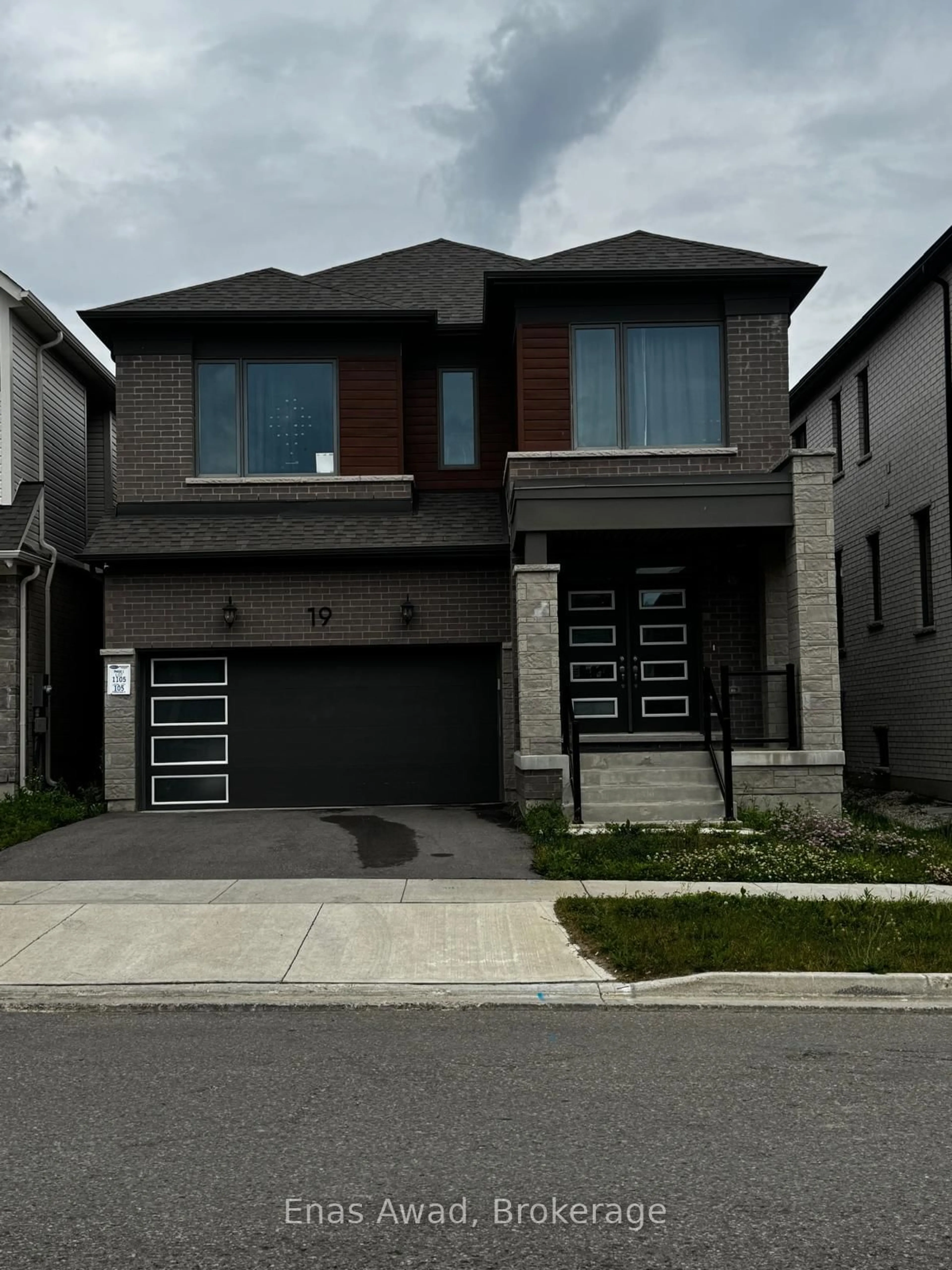 Home with brick exterior material, street for 19 William Nador St, Kitchener Ontario N2R 0S3