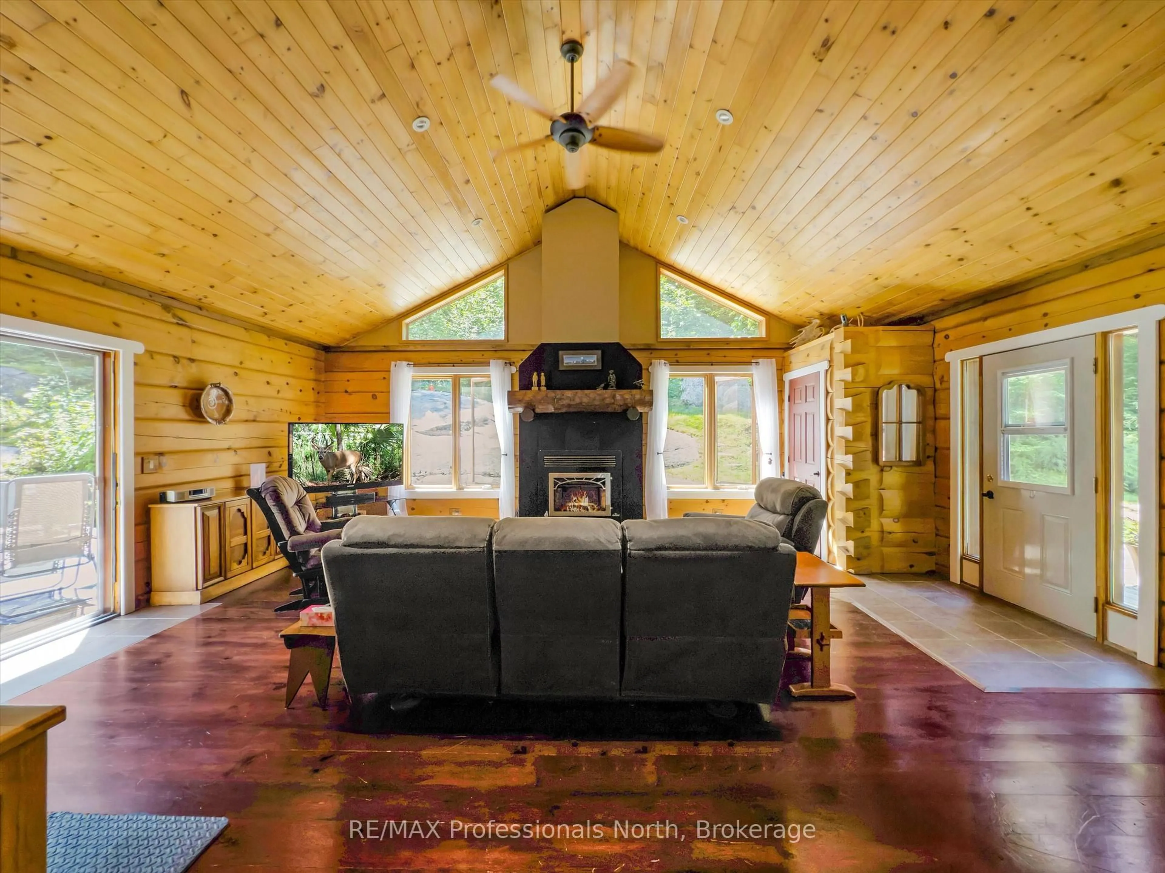 Living room with furniture, wood/laminate floor for 2351 Falkenburg Rd, Muskoka Lakes Ontario P0B 1J0
