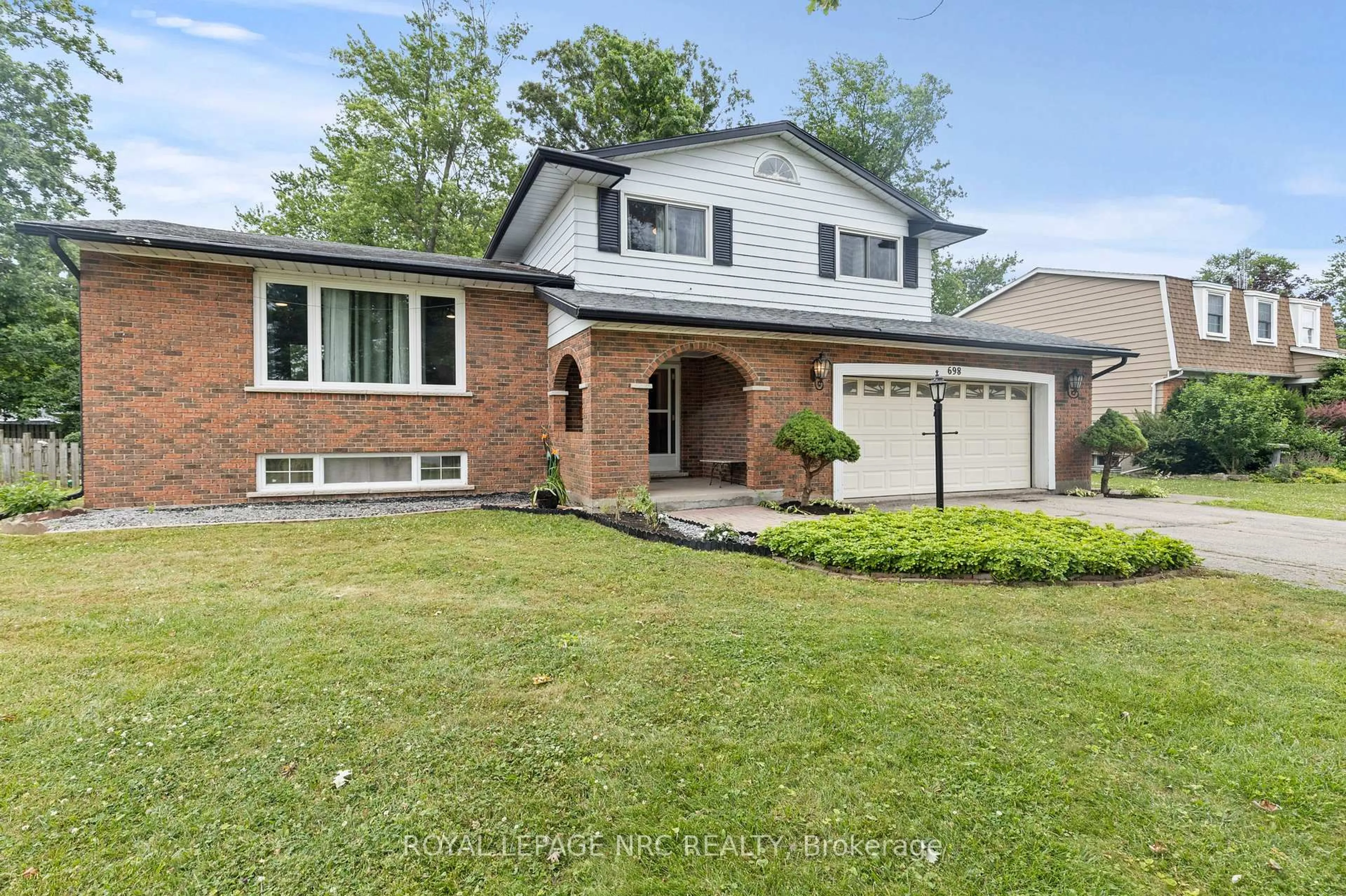 Home with brick exterior material, street for 698 Daytona Dr, Fort Erie Ontario L2A 4Z6
