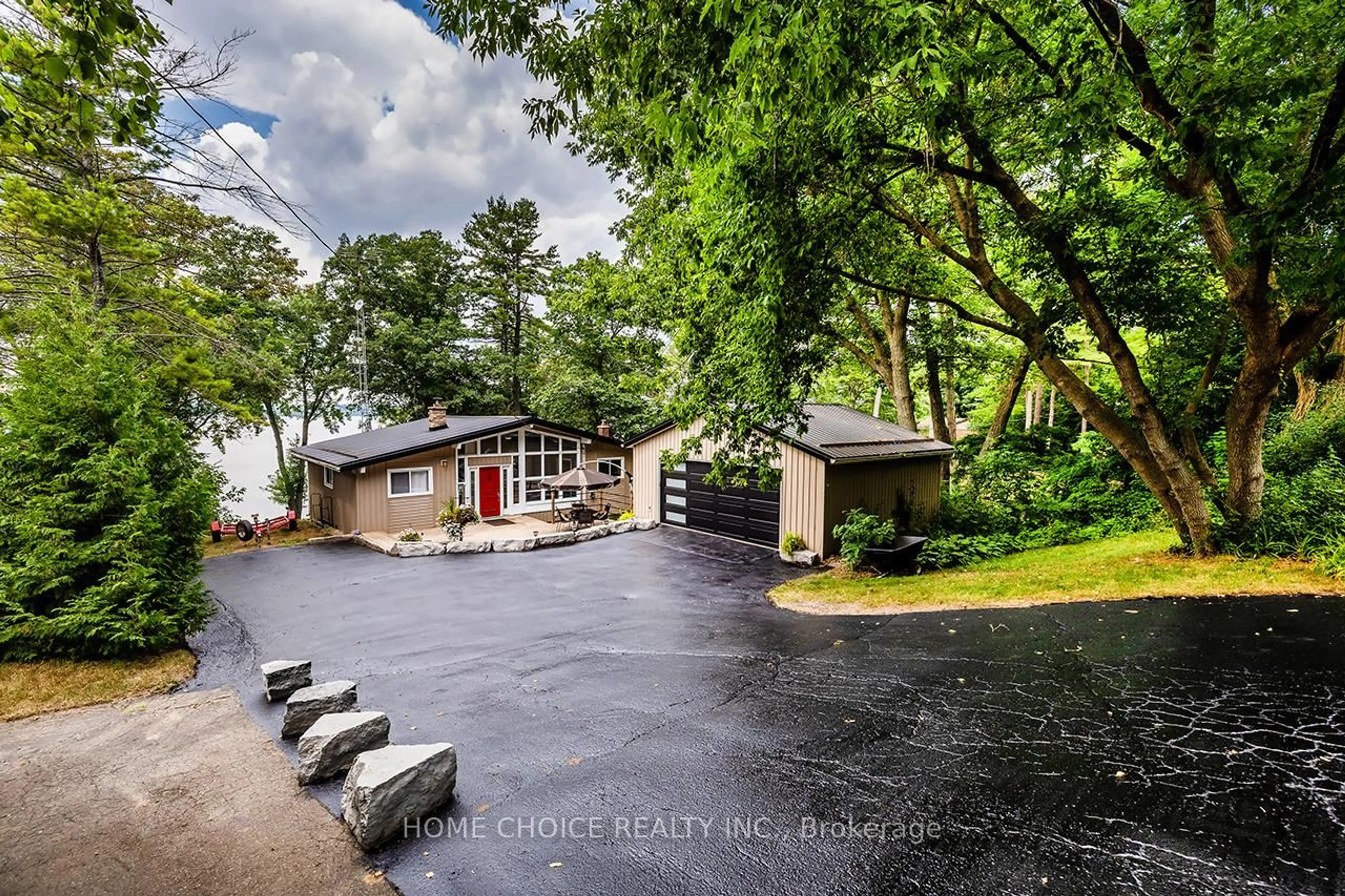 A pic from outside/outdoor area/front of a property/back of a property/a pic from drone, unknown for 7508 Bamsey Dr, Hamilton Township Ontario K0L 1E0