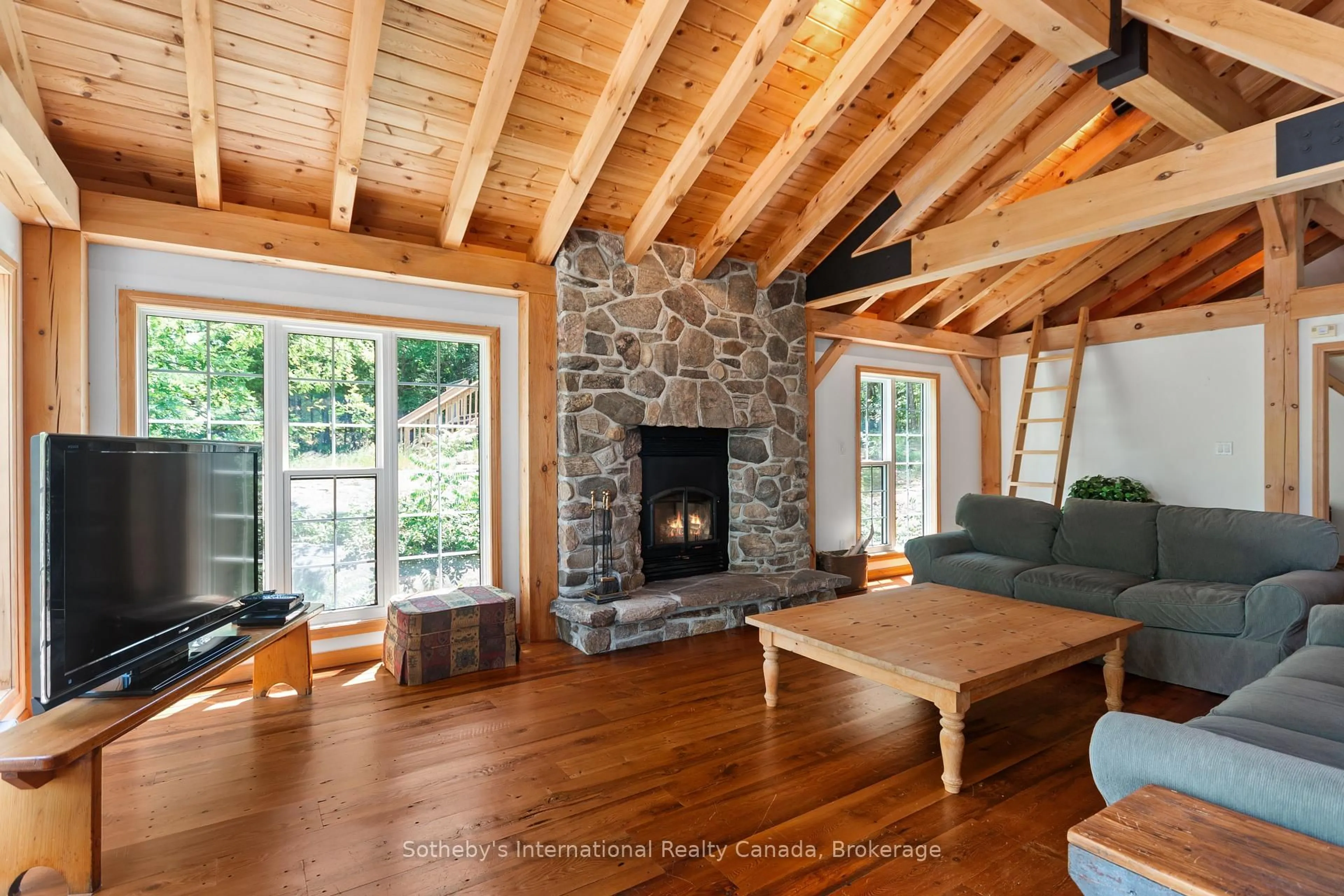 Living room with furniture, wood/laminate floor for 520 Is 80 Go Home Lake, Georgian Bay Ontario P0C 1H0