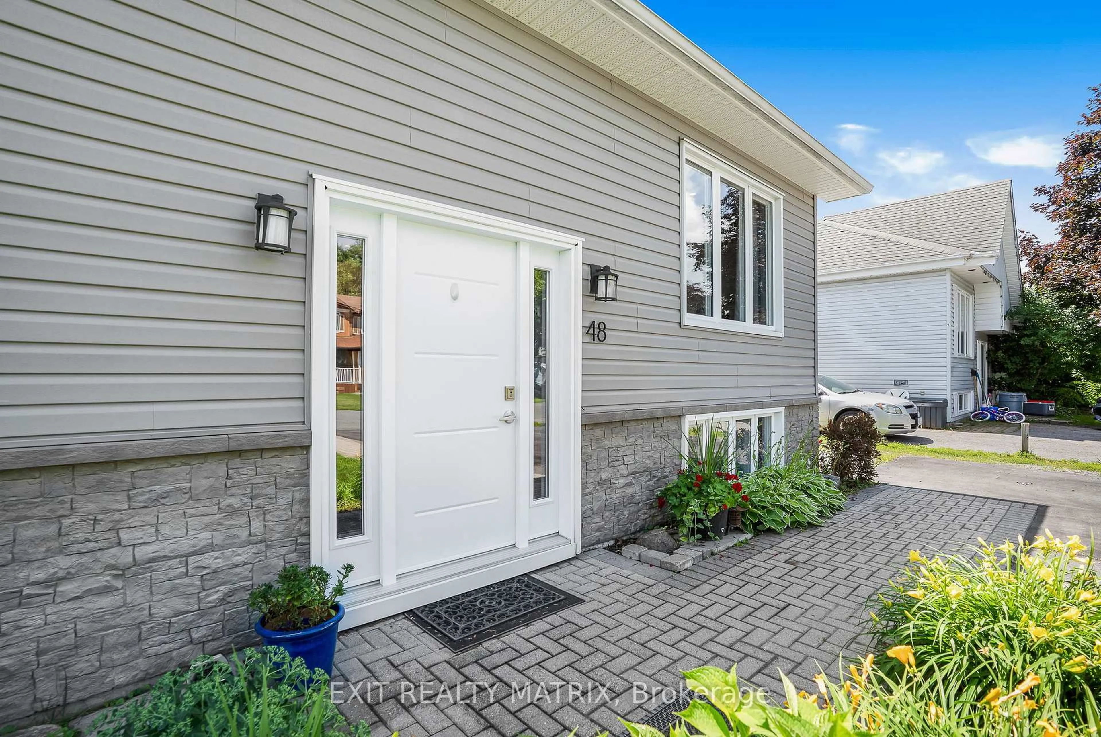 Home with vinyl exterior material, street for 48 Albert St, Russell Ontario K0A 1W0