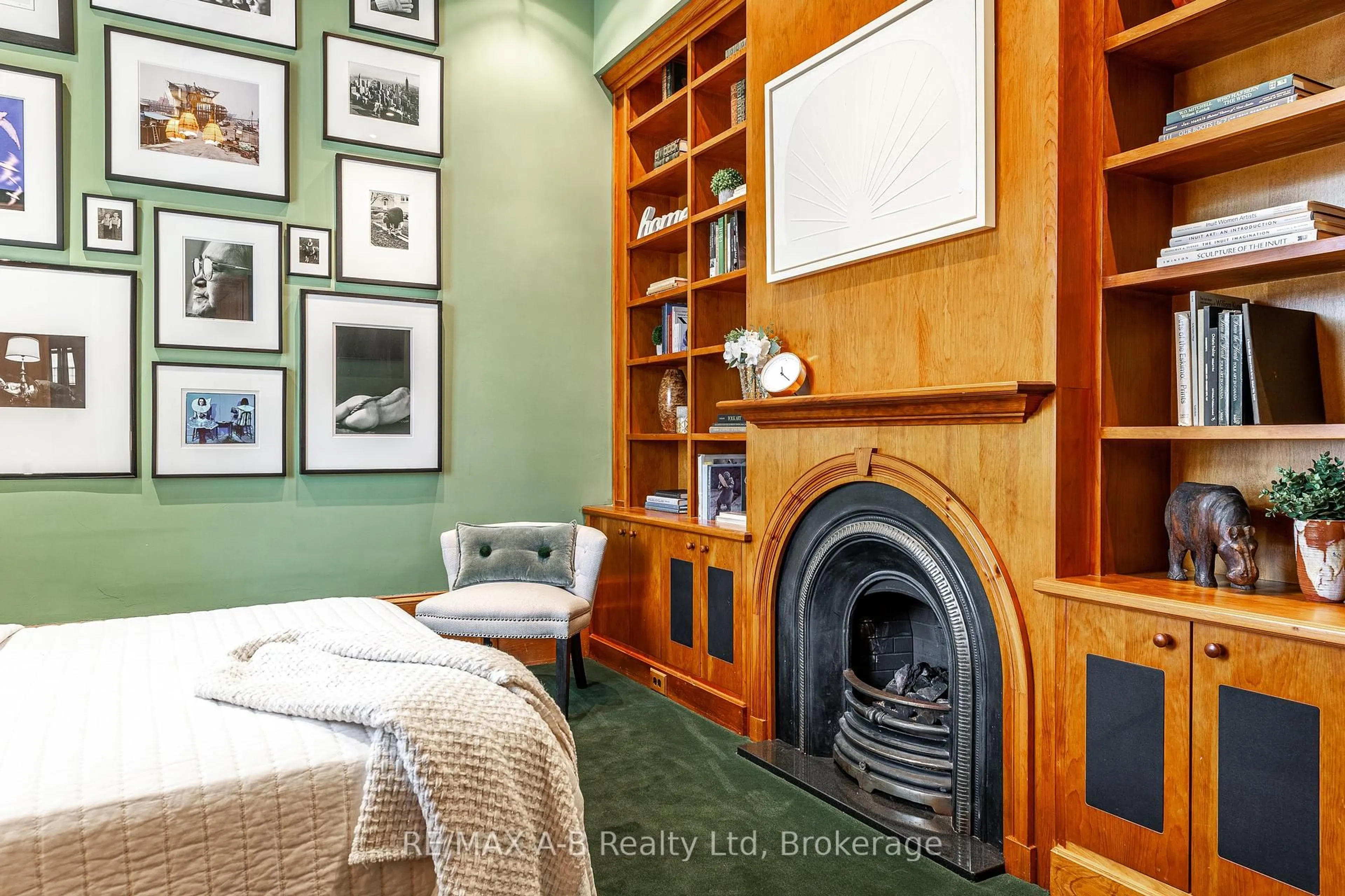 Bedroom with bed, wood/laminate floor for 21 Birmingham St, Stratford Ontario N5A 2S5