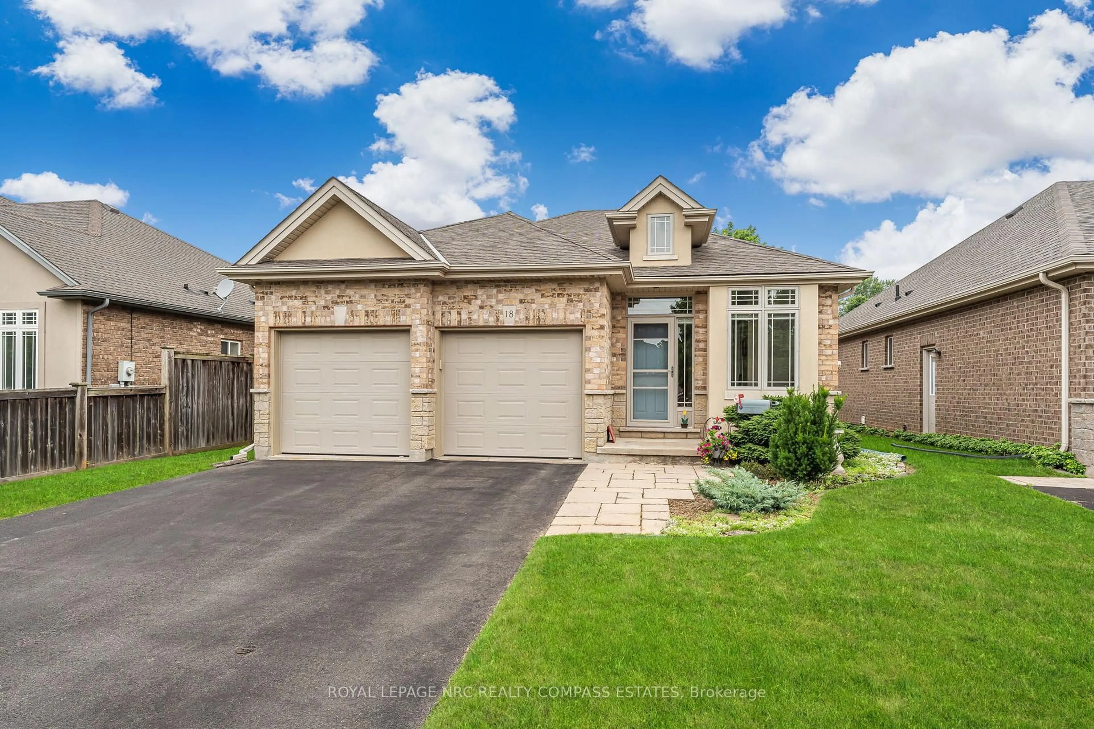 Home with brick exterior material, street for 18 Willson Crossing, Pelham Ontario L0S 1E4