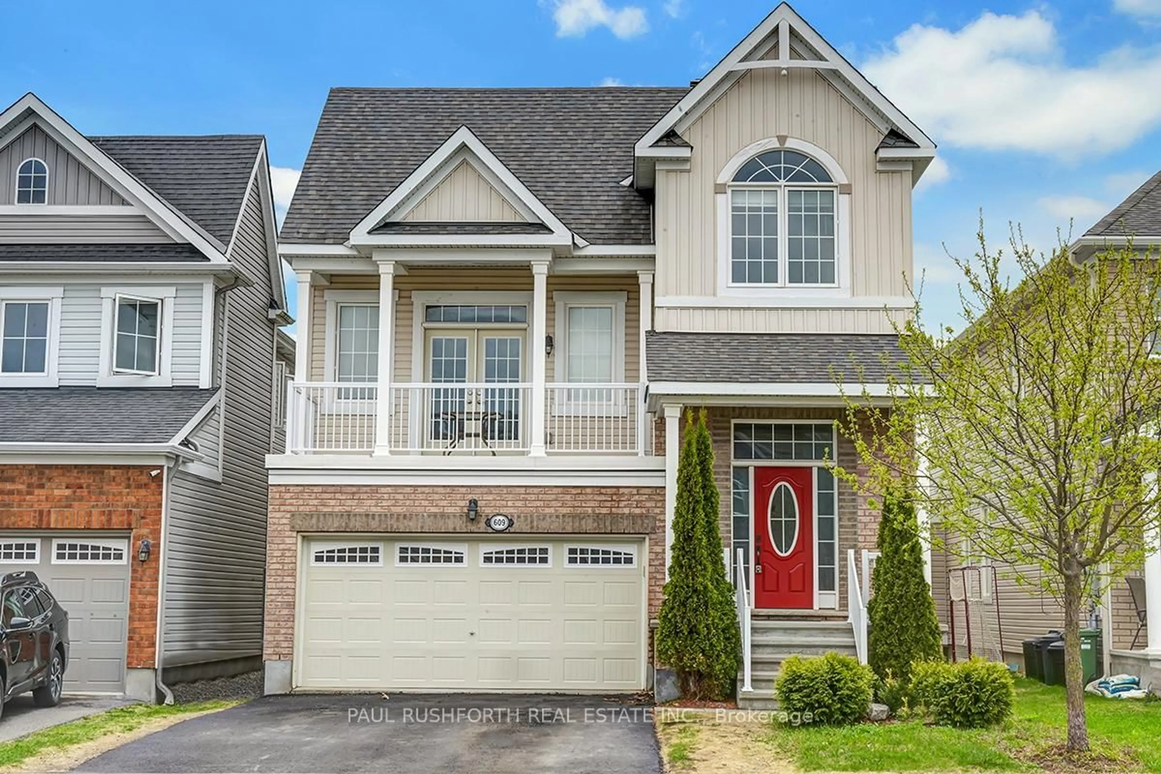 Home with vinyl exterior material, street for 609 Dundonald Dr, Ottawa Ontario K2J 5Y8