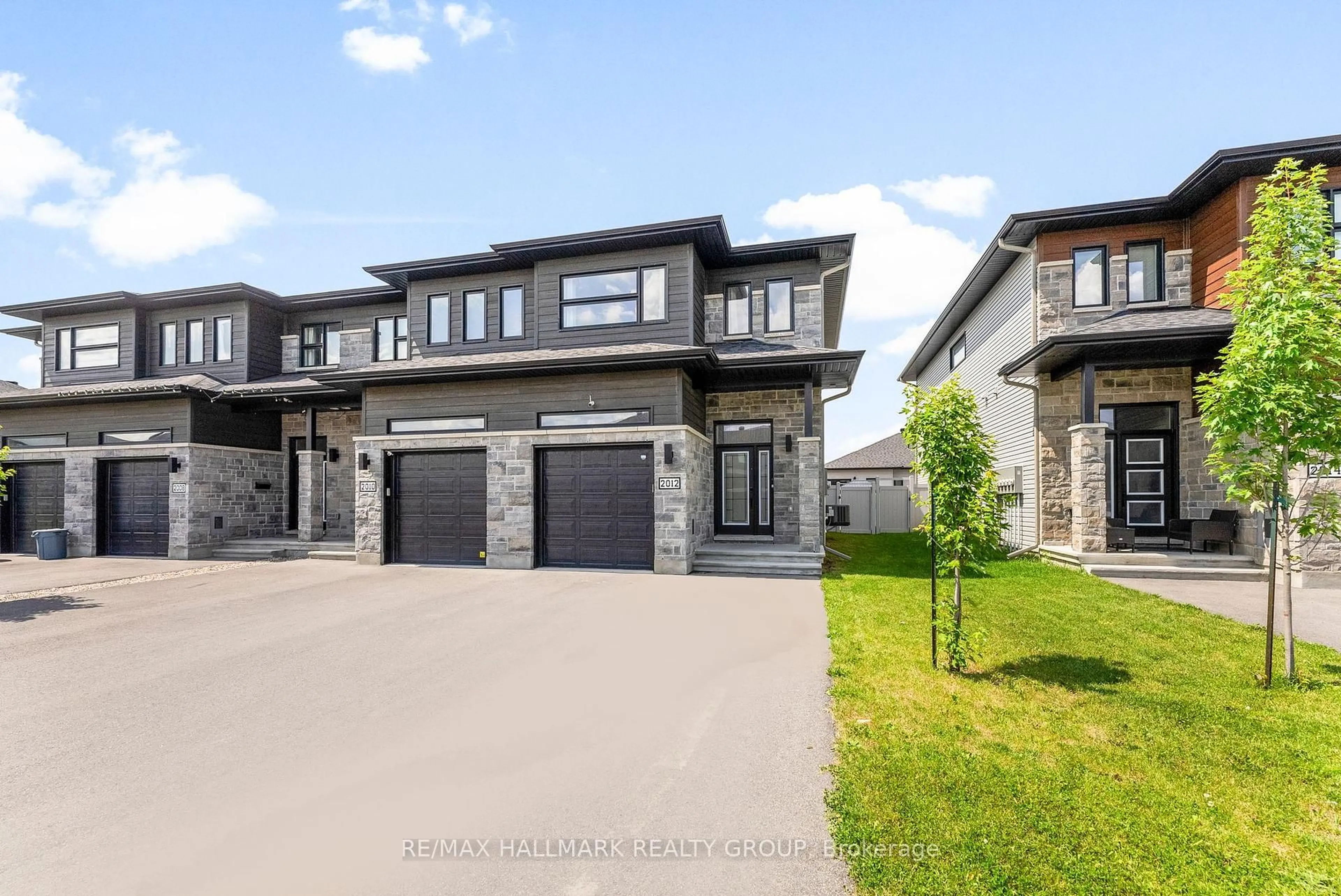 A pic from outside/outdoor area/front of a property/back of a property/a pic from drone, street for 2012 Berne St, Russell Ontario K0A 1W0