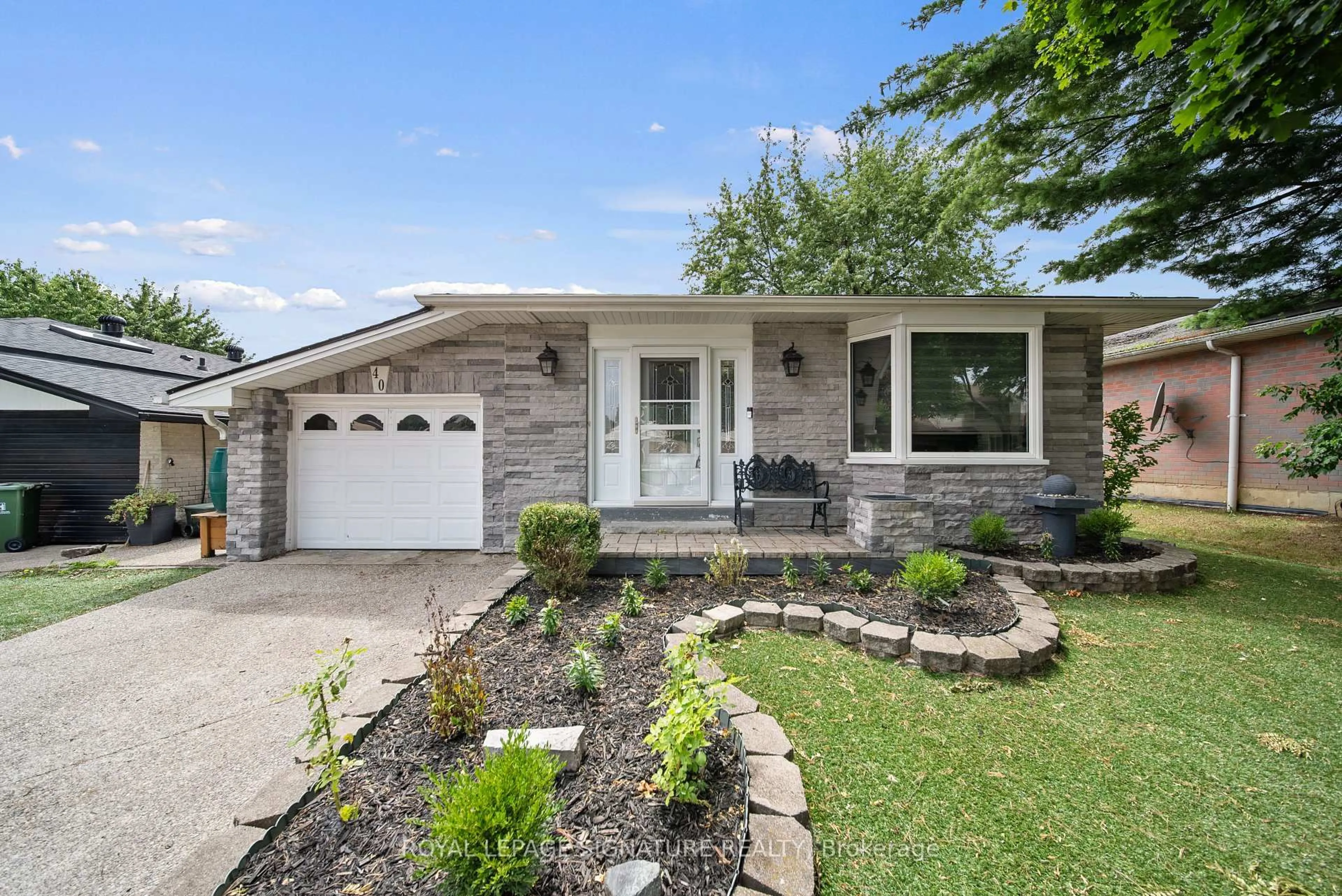 Home with brick exterior material, street for 40 Queenslea Dr, Hamilton Ontario L8W 1G1