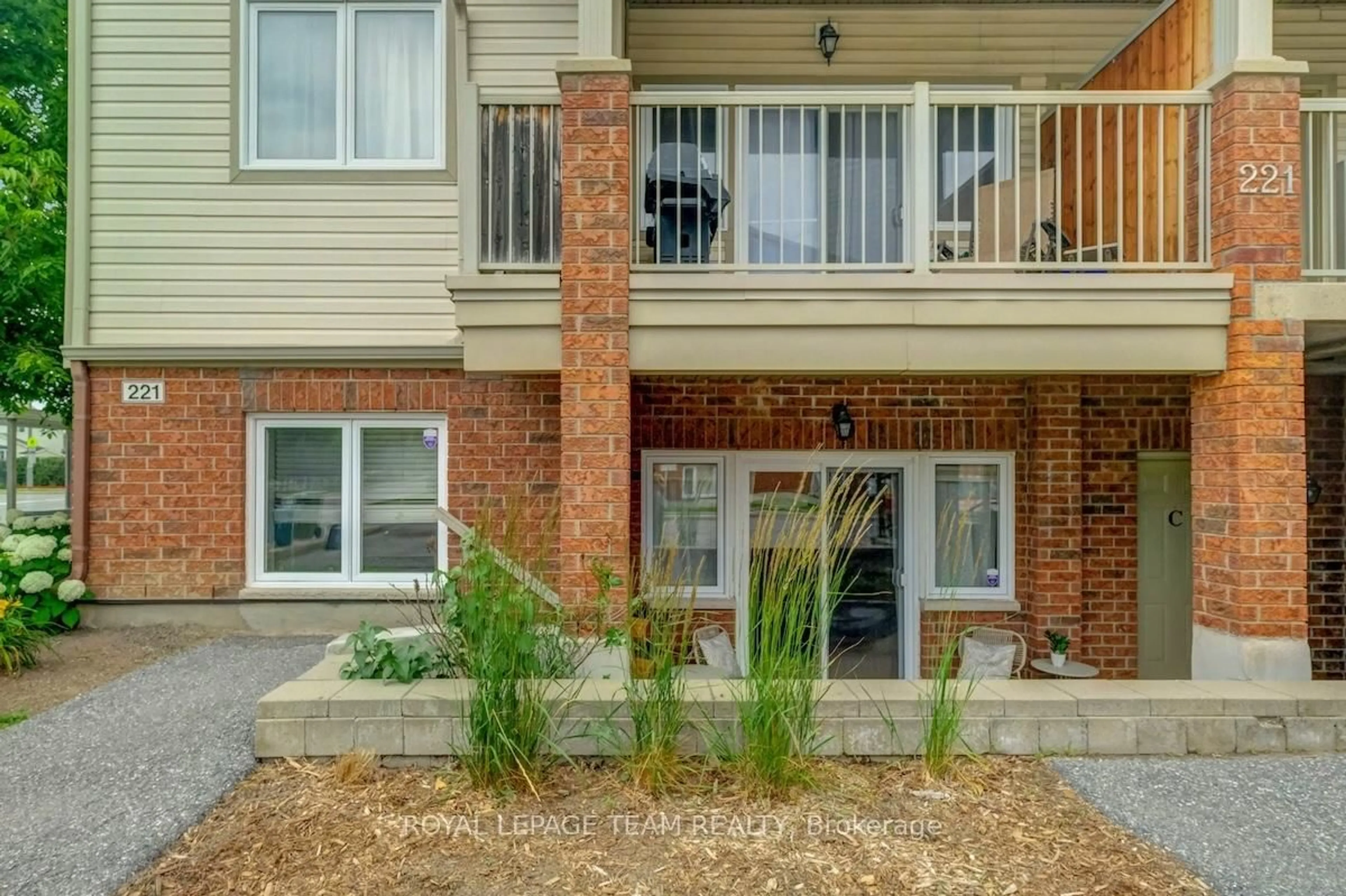 Home with brick exterior material, street for 221 Crestway Dr #C, Ottawa Ontario K2G 0A9