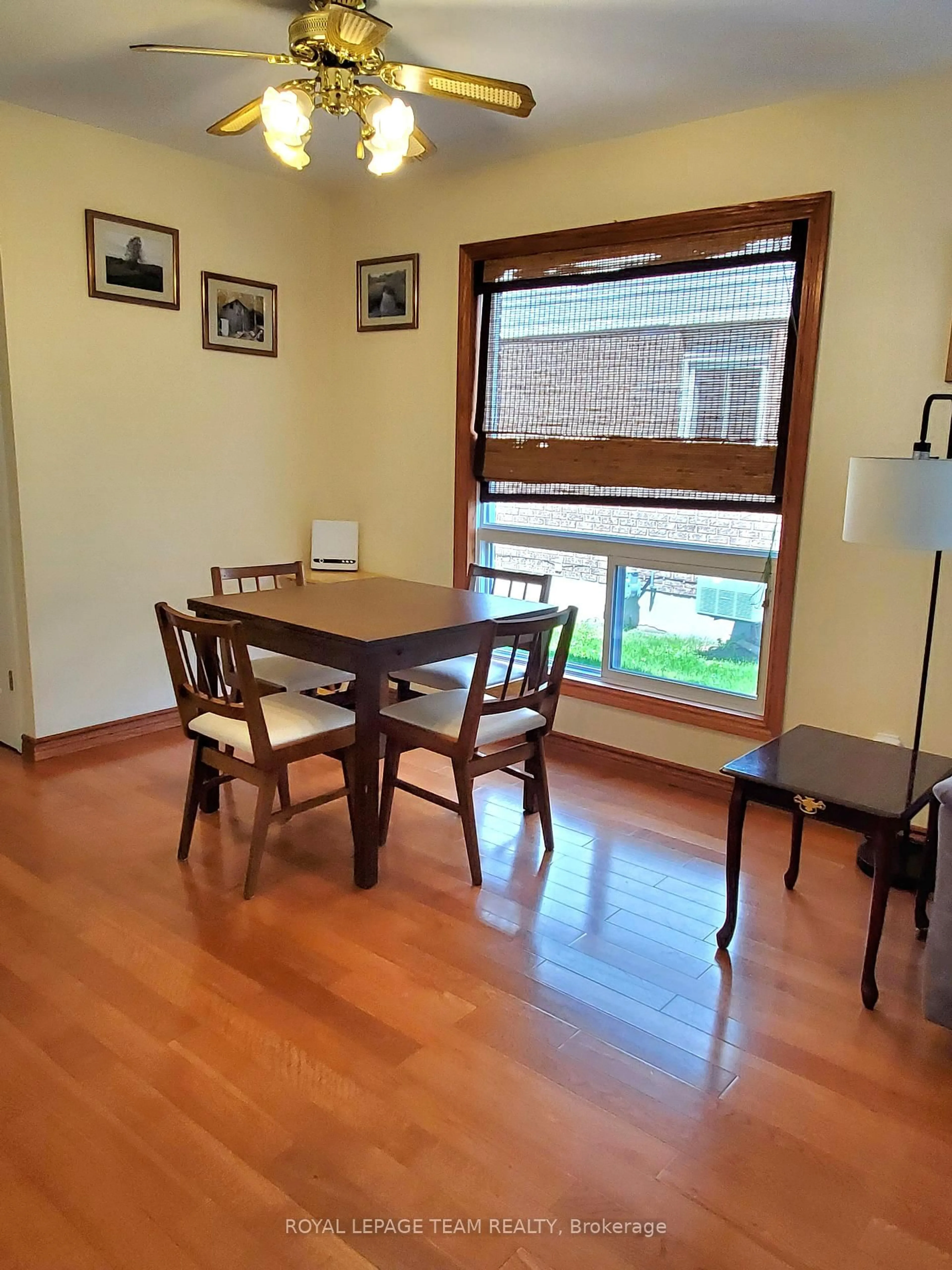 Dining room, wood/laminate floor for 61 McGibbon Dr, Kanata Ontario K2L 4A6
