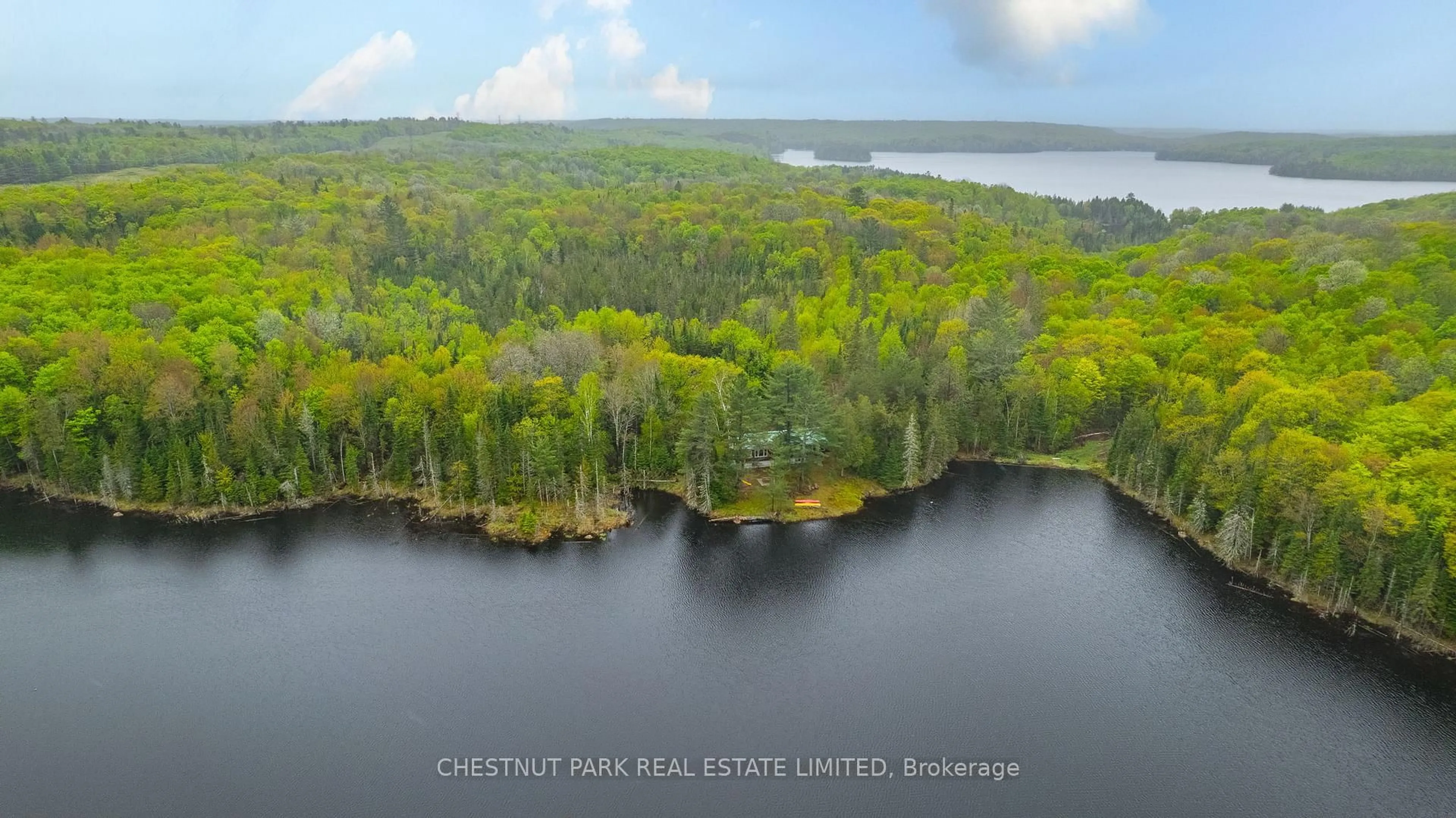 A pic from outside/outdoor area/front of a property/back of a property/a pic from drone, water/lake/river/ocean view for 2411 Soyers Lake Rd, Minden Hills Ontario K0M 1S0
