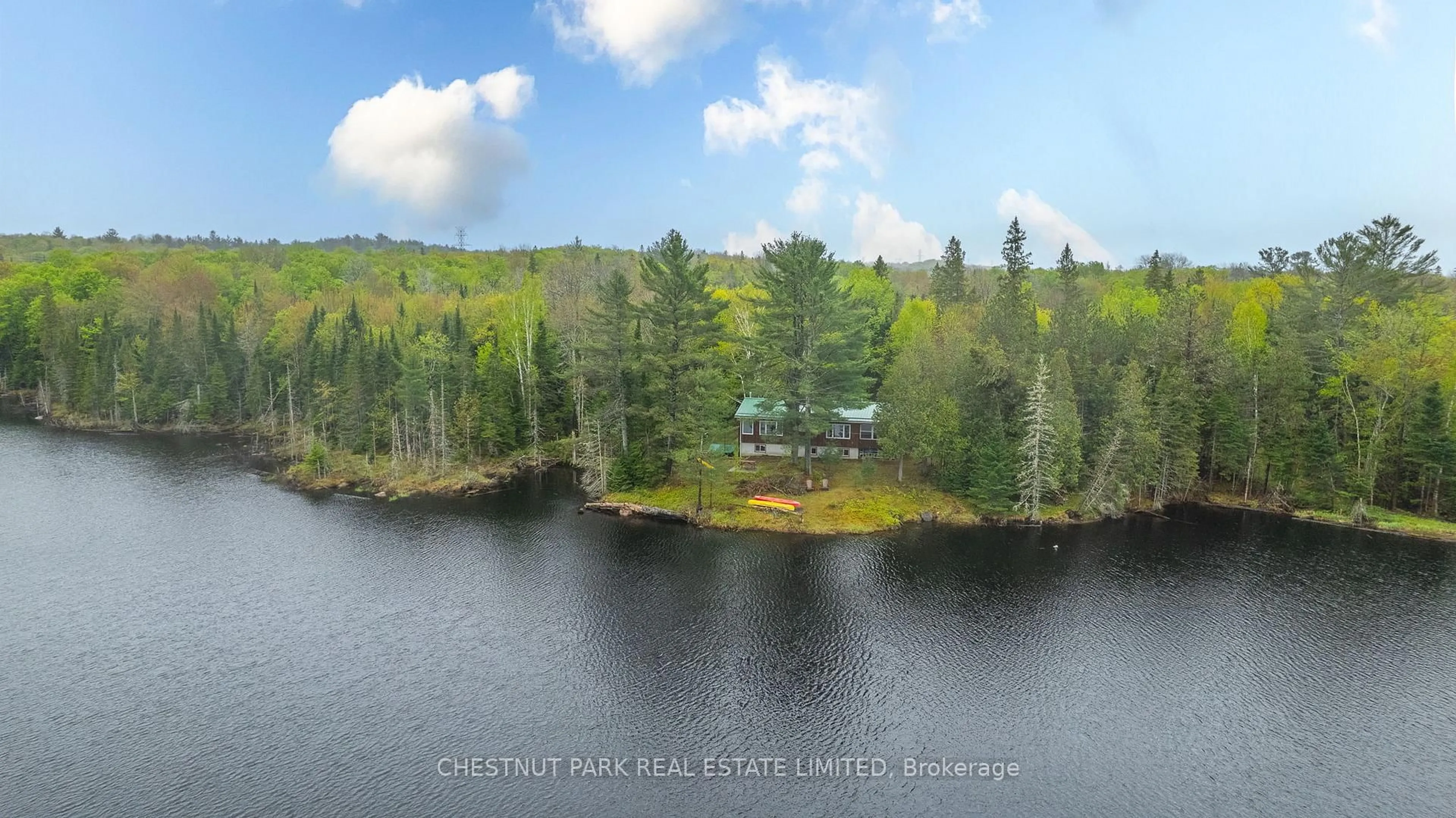A pic from outside/outdoor area/front of a property/back of a property/a pic from drone, water/lake/river/ocean view for 2411 Soyers Lake Rd, Minden Hills Ontario K0M 1S0