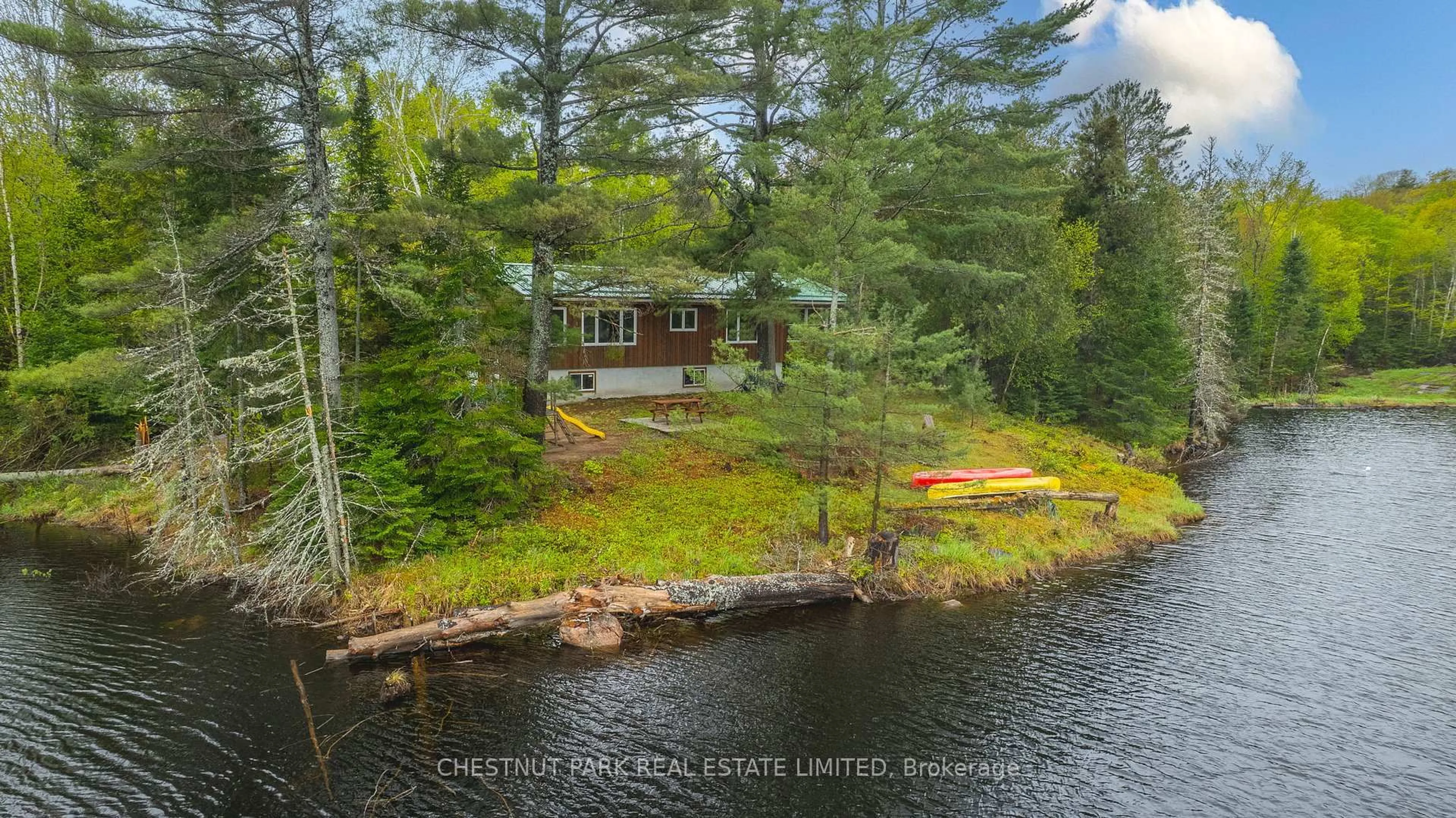 A pic from outside/outdoor area/front of a property/back of a property/a pic from drone, water/lake/river/ocean view for 2411 Soyers Lake Rd, Minden Hills Ontario K0M 1S0
