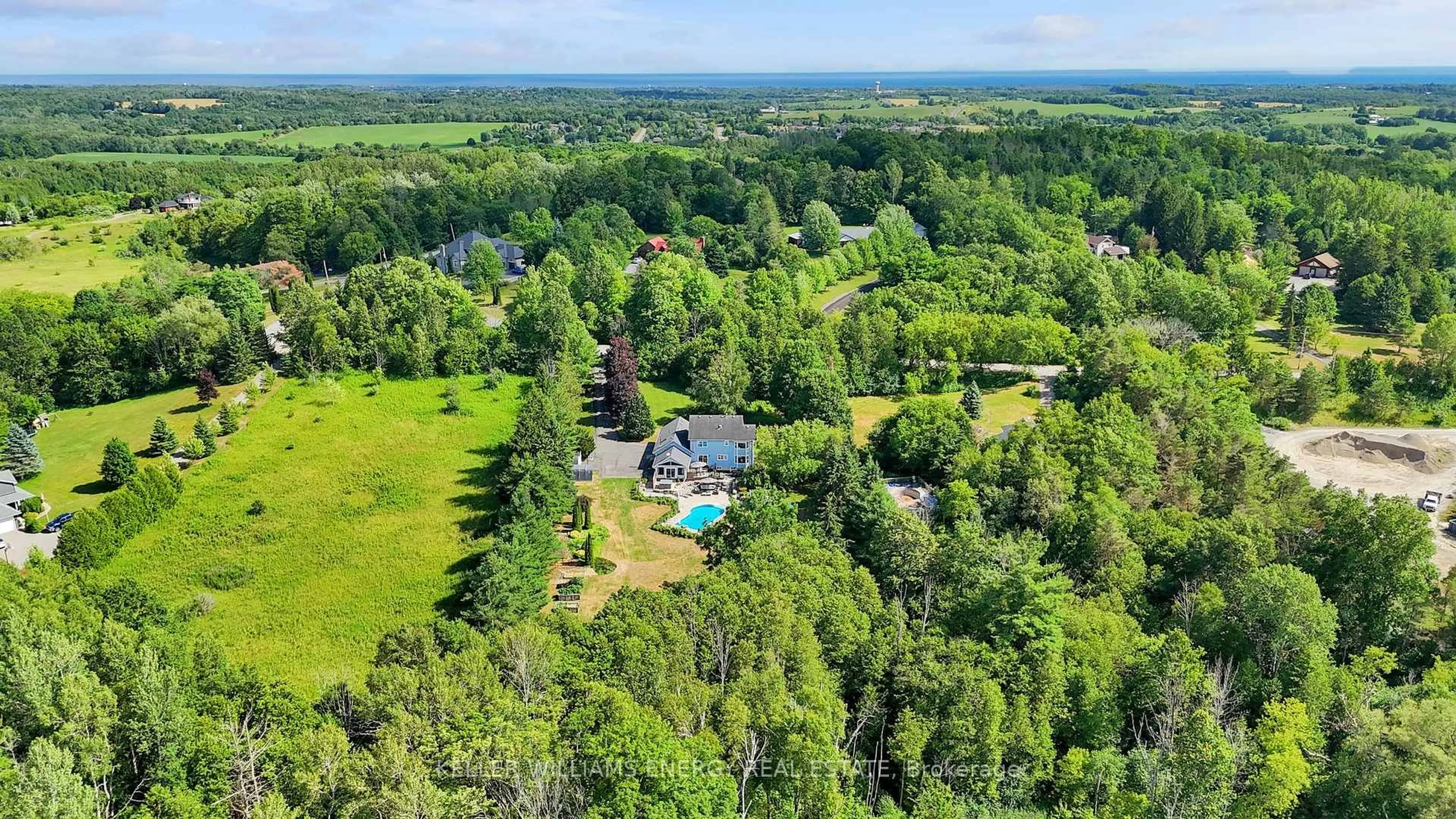 A pic from outside/outdoor area/front of a property/back of a property/a pic from drone, water/lake/river/ocean view for 8378 Majestic Hills Dr, Hamilton Township Ontario K9A 4J7