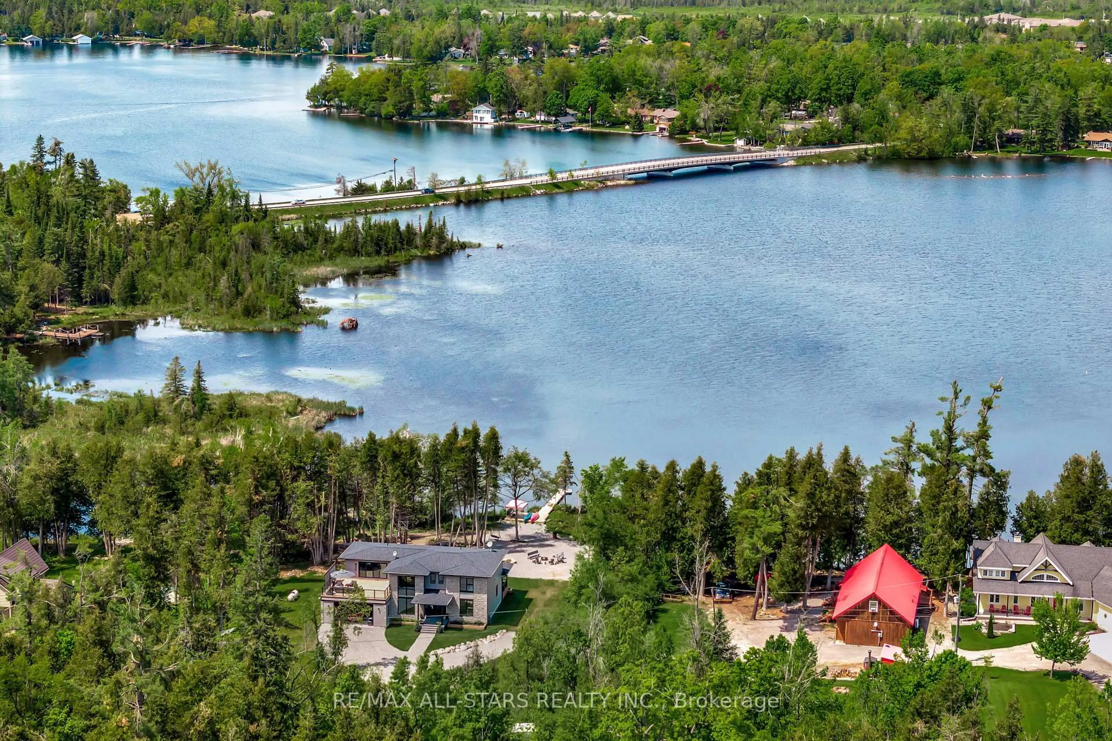 A pic from outside/outdoor area/front of a property/back of a property/a pic from drone, water/lake/river/ocean view for 15 Berry Lane, Kawartha Lakes Ontario K0M 1A0