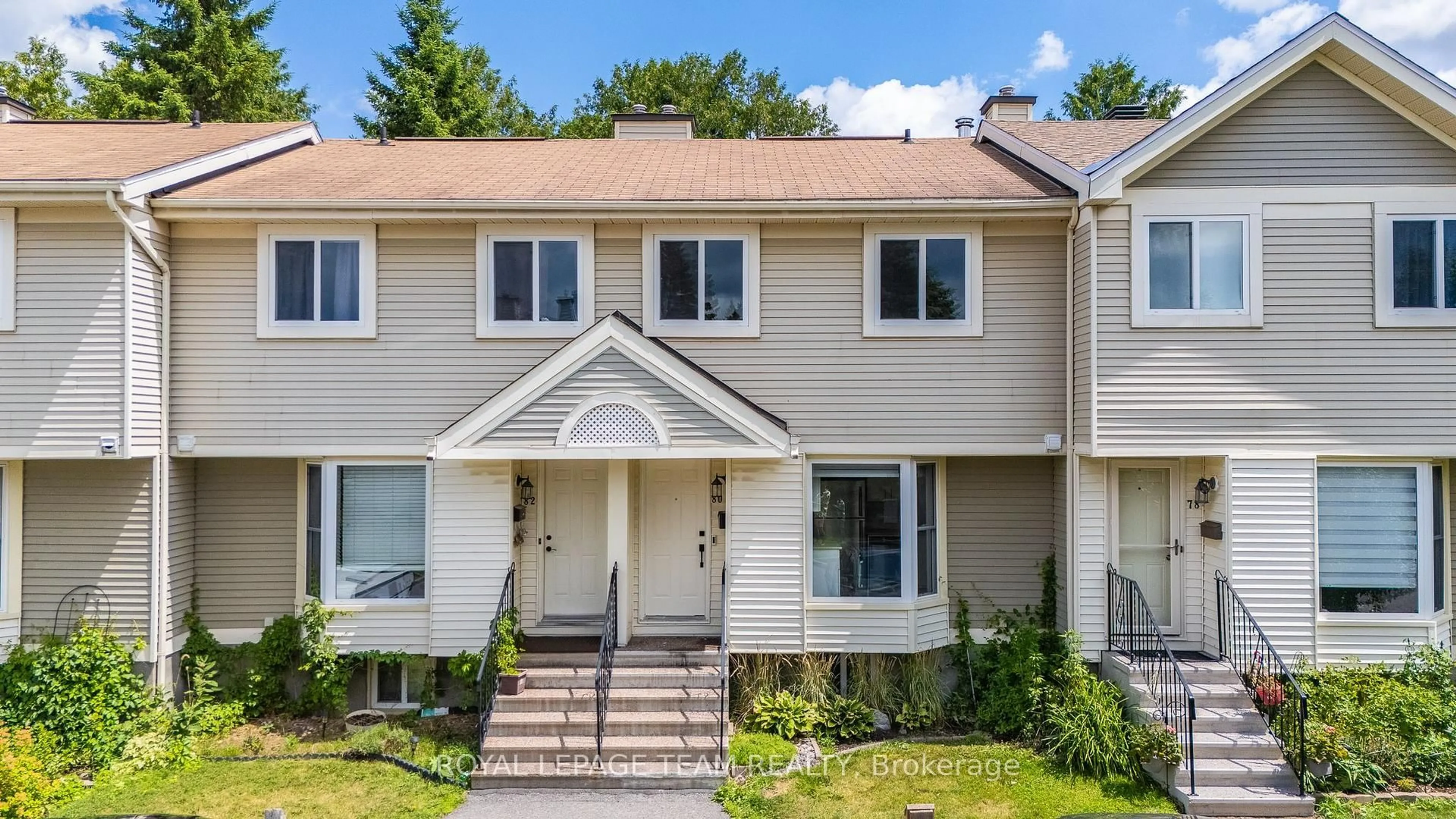 Home with vinyl exterior material, street for 80 Mcdermot Crt #20, Kanata Ontario K2L 3V1