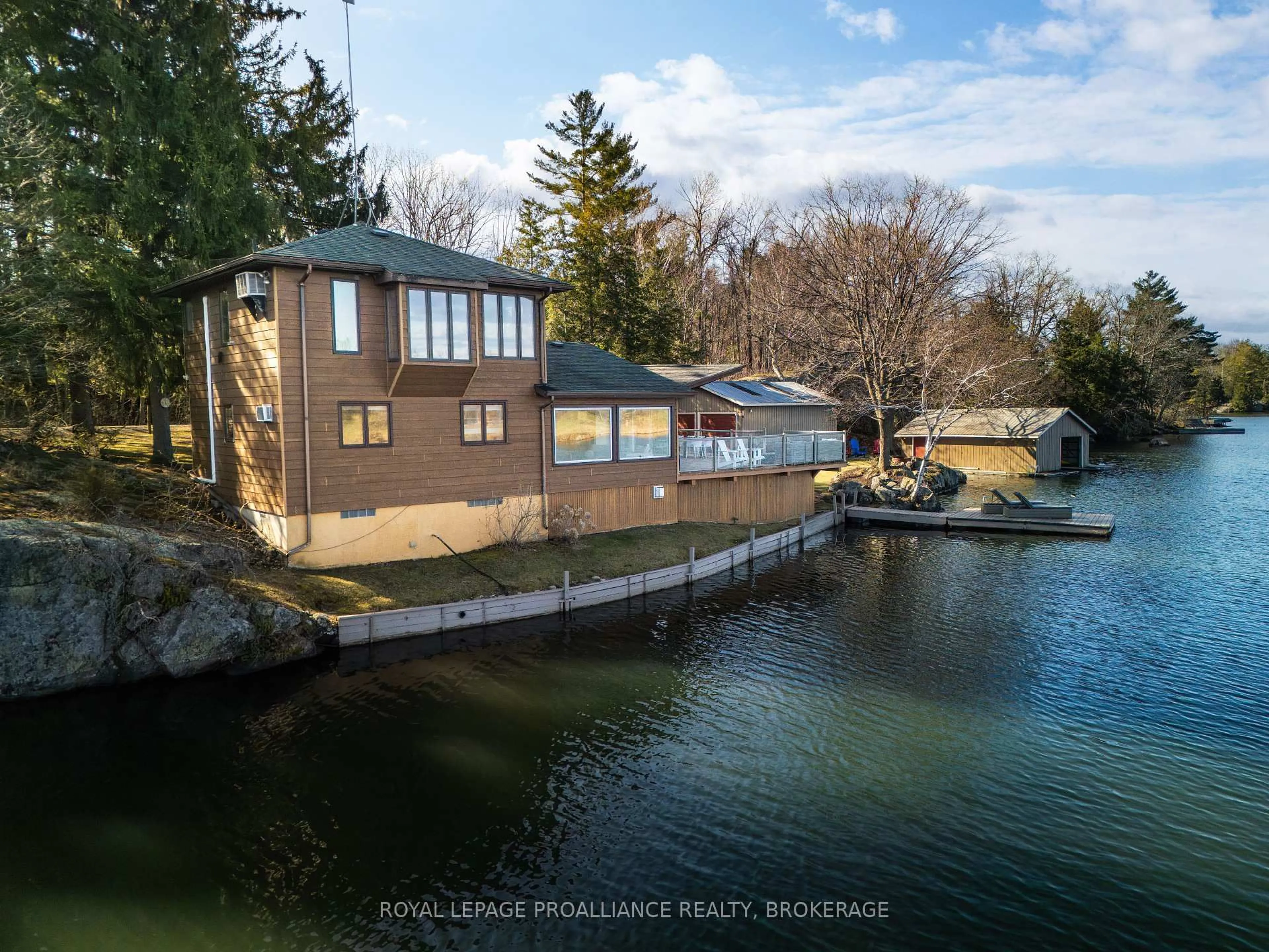 A pic from outside/outdoor area/front of a property/back of a property/a pic from drone, water/lake/river/ocean view for 4808 Leo Lake Rd, Seeley's Bay Ontario K0H 2N0