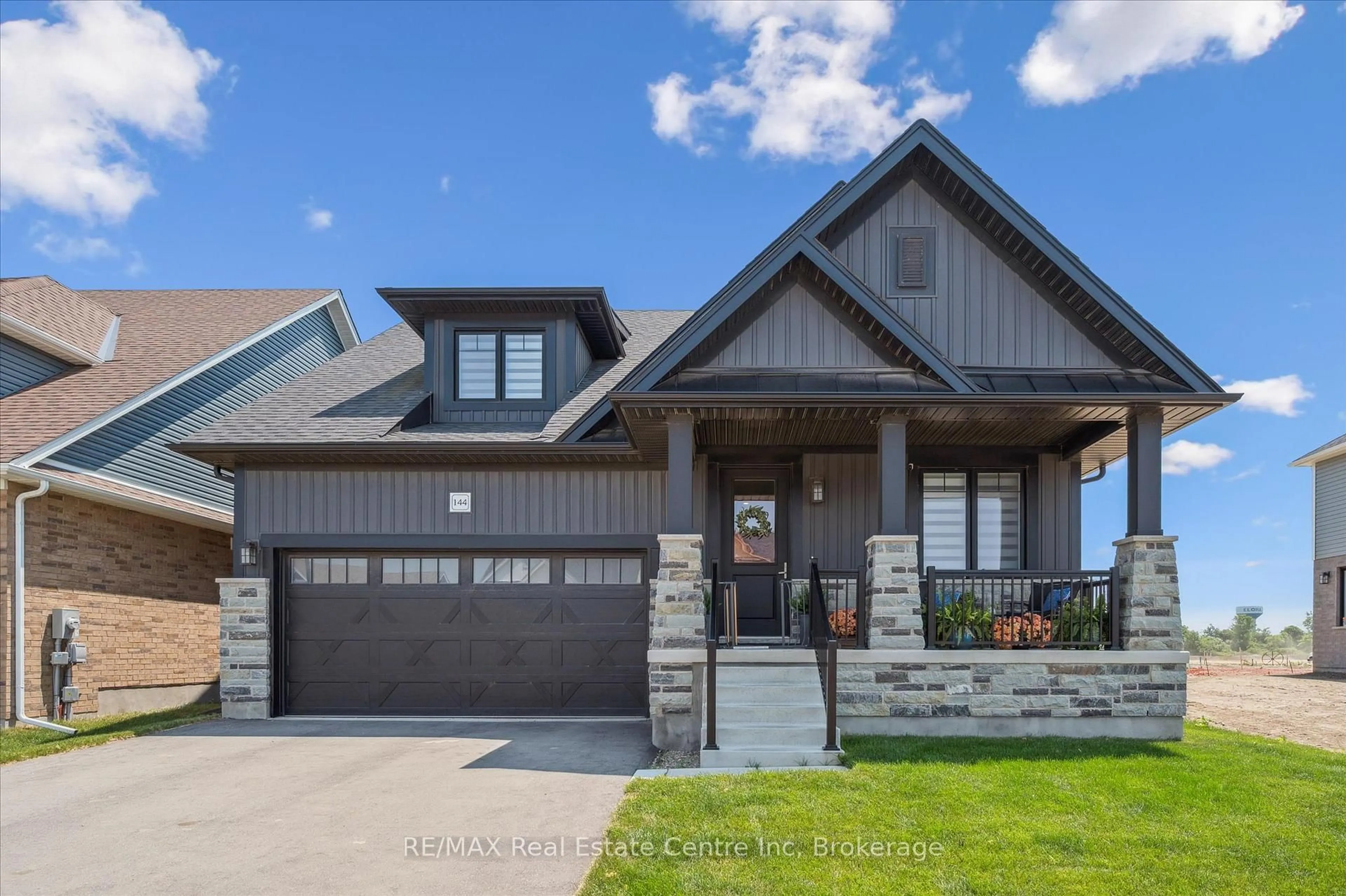 Home with brick exterior material, street for 144 Haylock Ave, Centre Wellington Ontario N0B 1S0