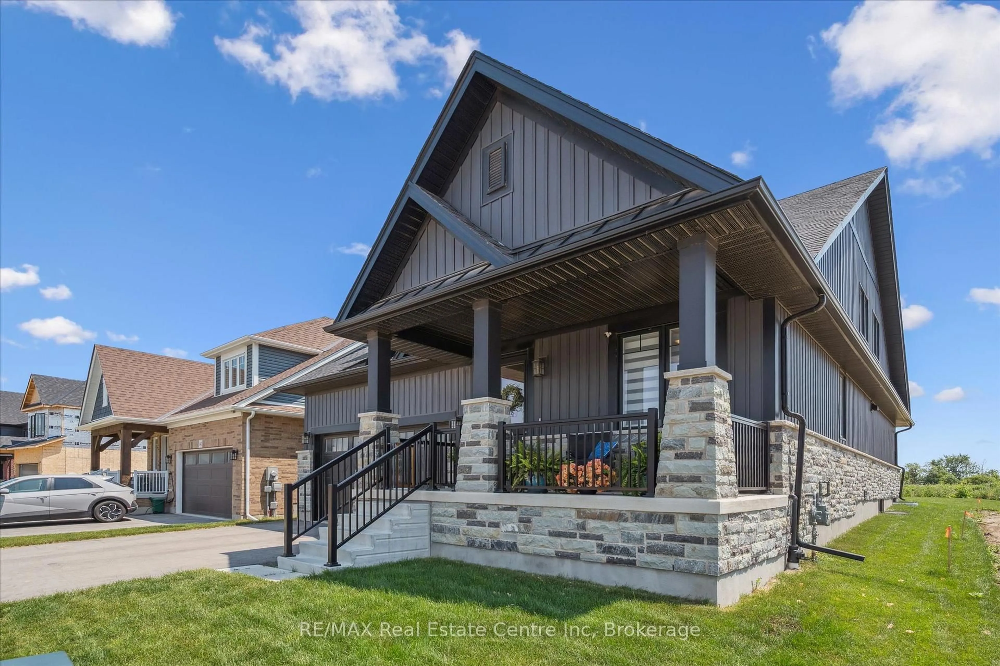 Home with brick exterior material, street for 144 Haylock Ave, Centre Wellington Ontario N0B 1S0