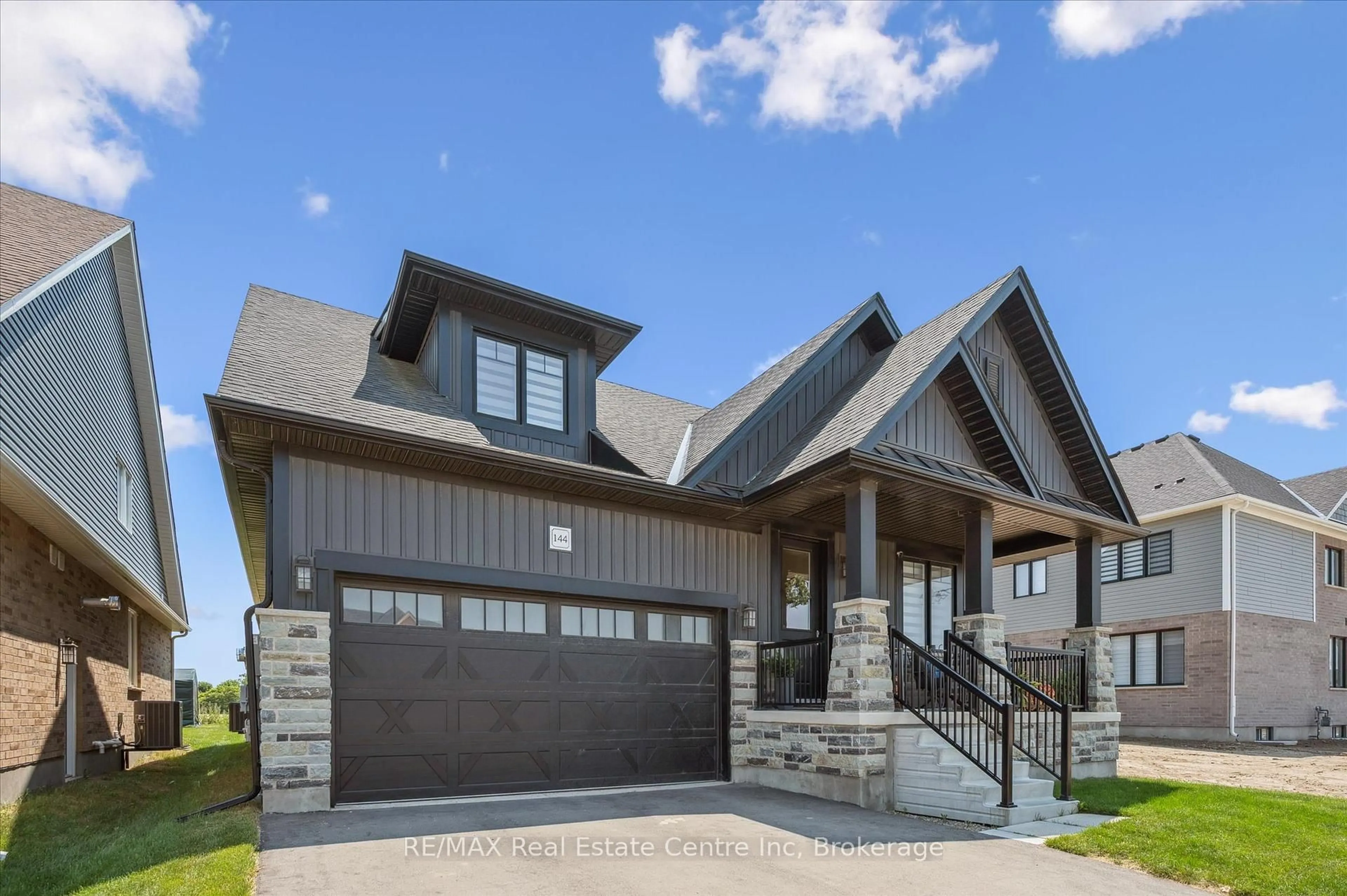 Home with brick exterior material, street for 144 Haylock Ave, Centre Wellington Ontario N0B 1S0
