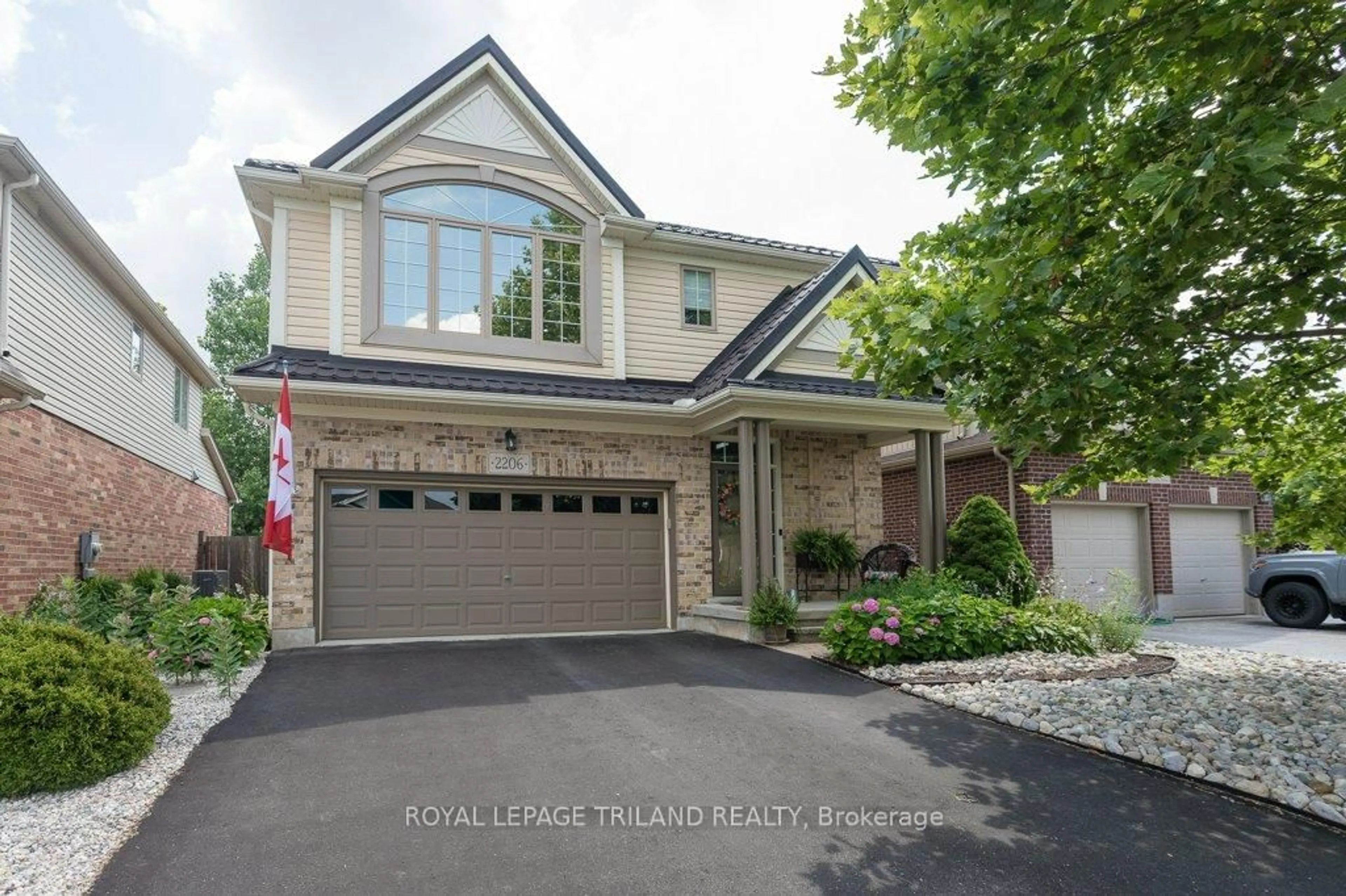 Home with brick exterior material, street for 2206 Lilac Ave, London South Ontario N6K 5C5