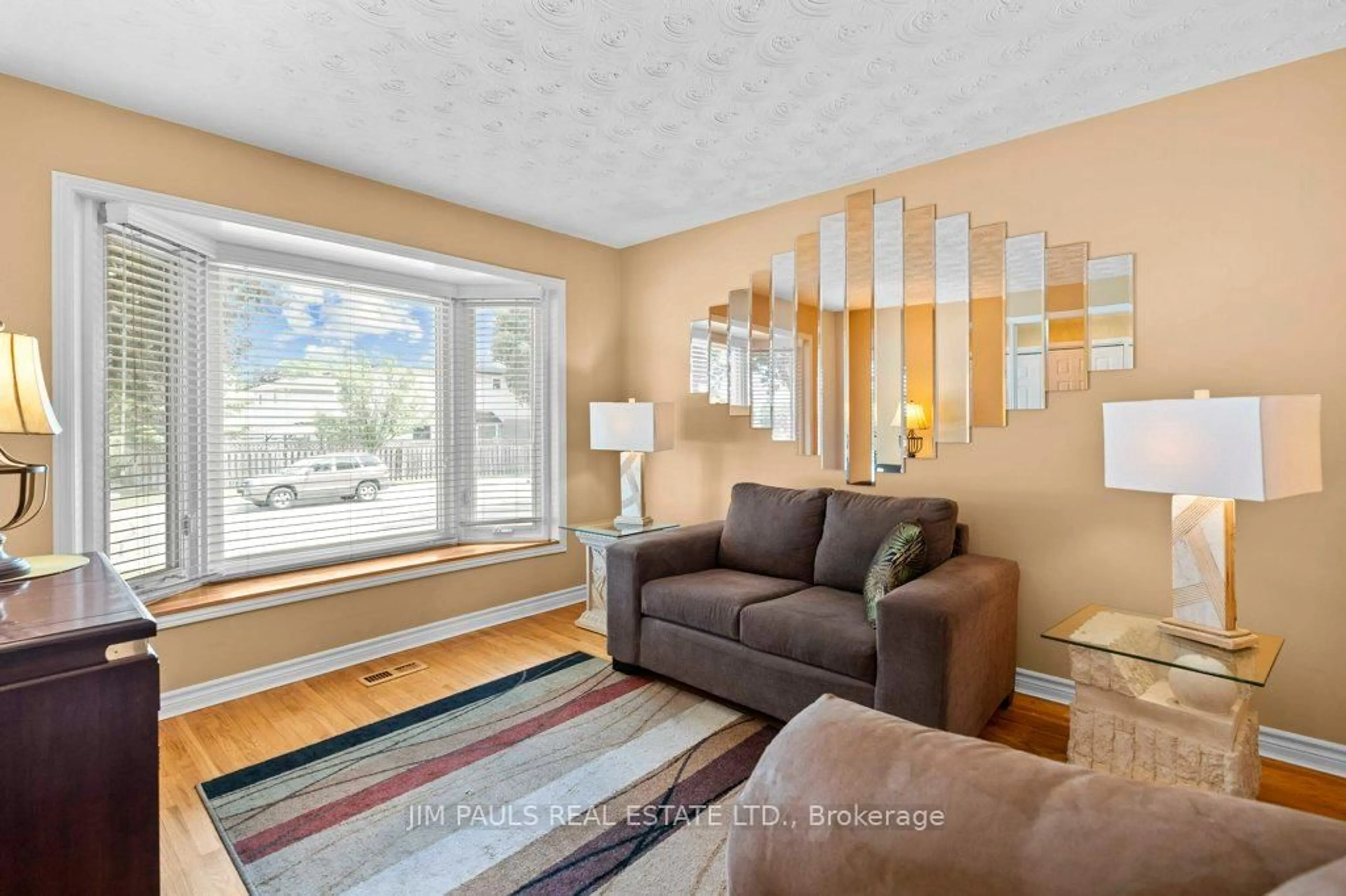 Living room with furniture, unknown for 64 Abbot Dr, Hamilton Ontario L8V 4W5