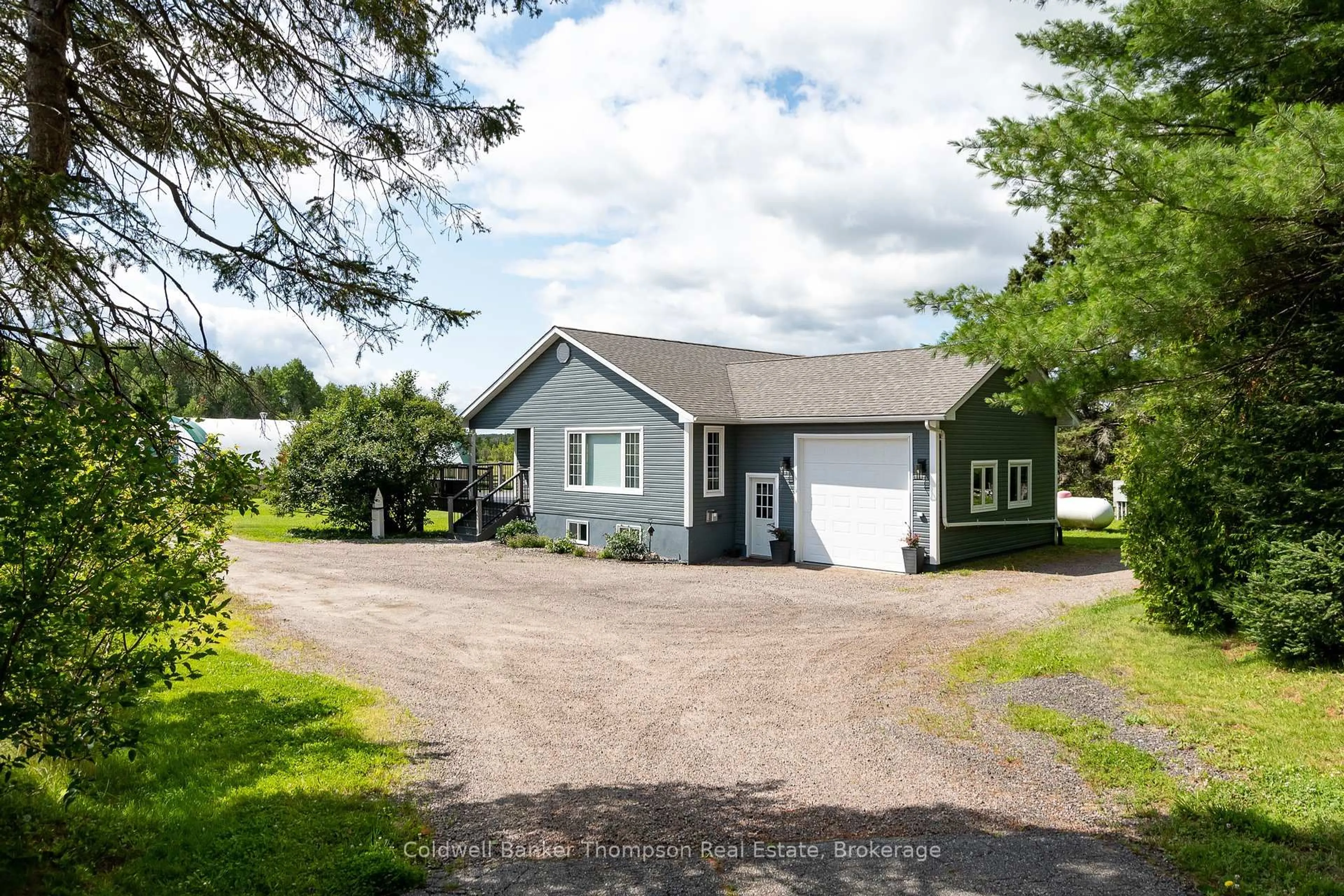 A pic from outside/outdoor area/front of a property/back of a property/a pic from drone, street for 3737 124 Highway, Magnetawan Ontario P0A 1Z0
