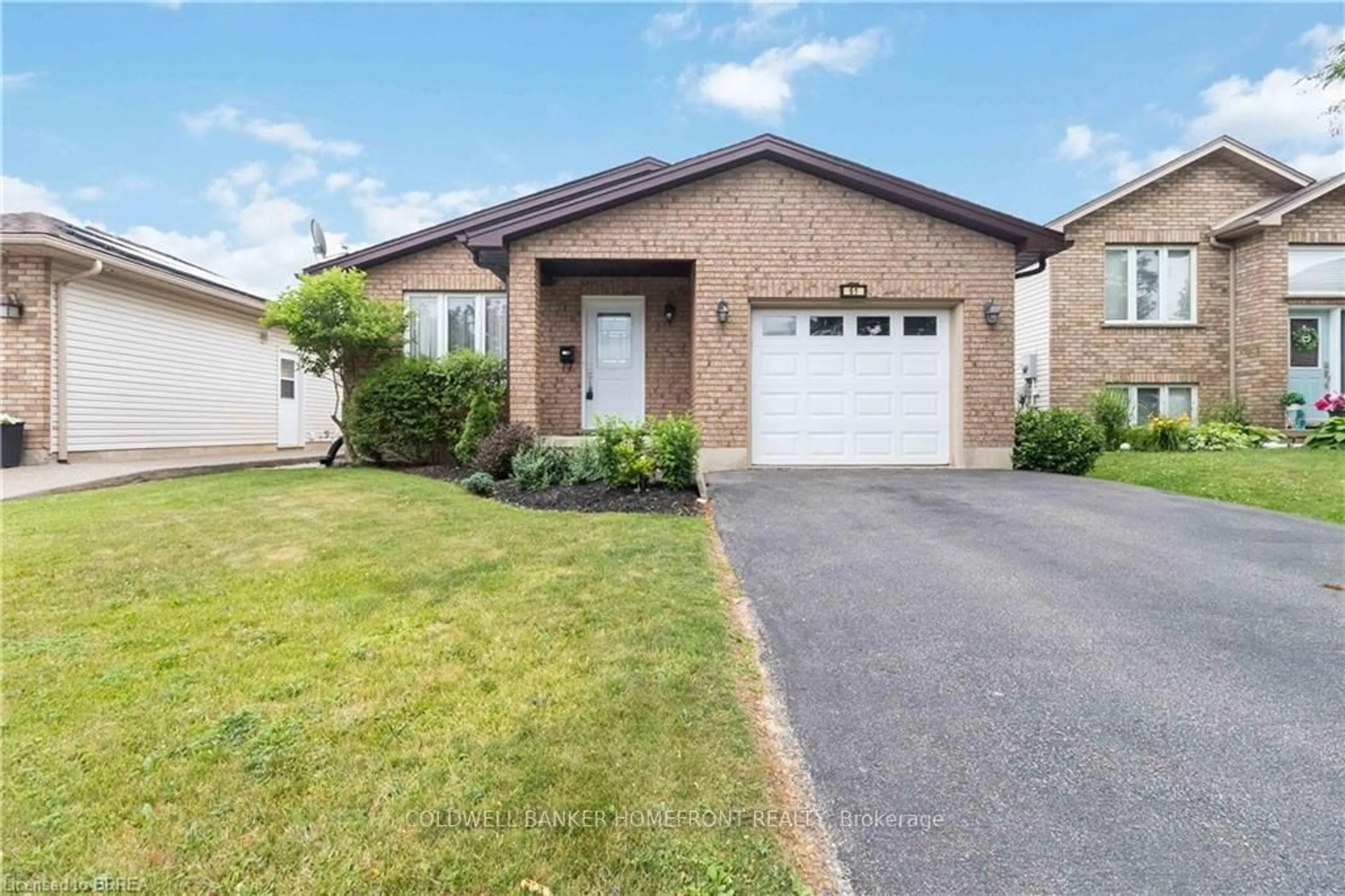 Home with brick exterior material, street for 61 St. Patrick's Dr, Brantford Ontario N3T 6L4