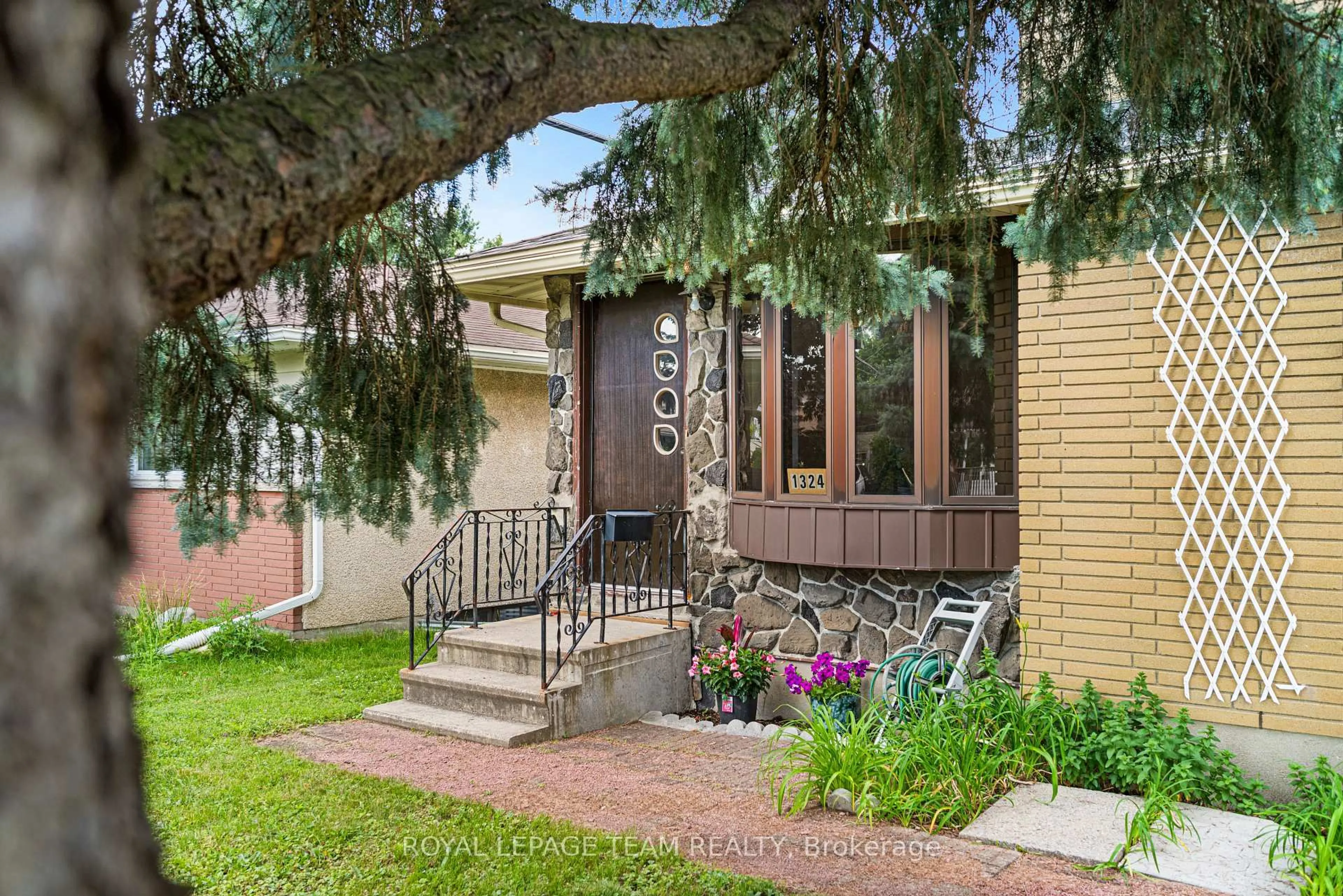Home with brick exterior material, street for 1324 P Ave, Ottawa Ontario K1G 0B4