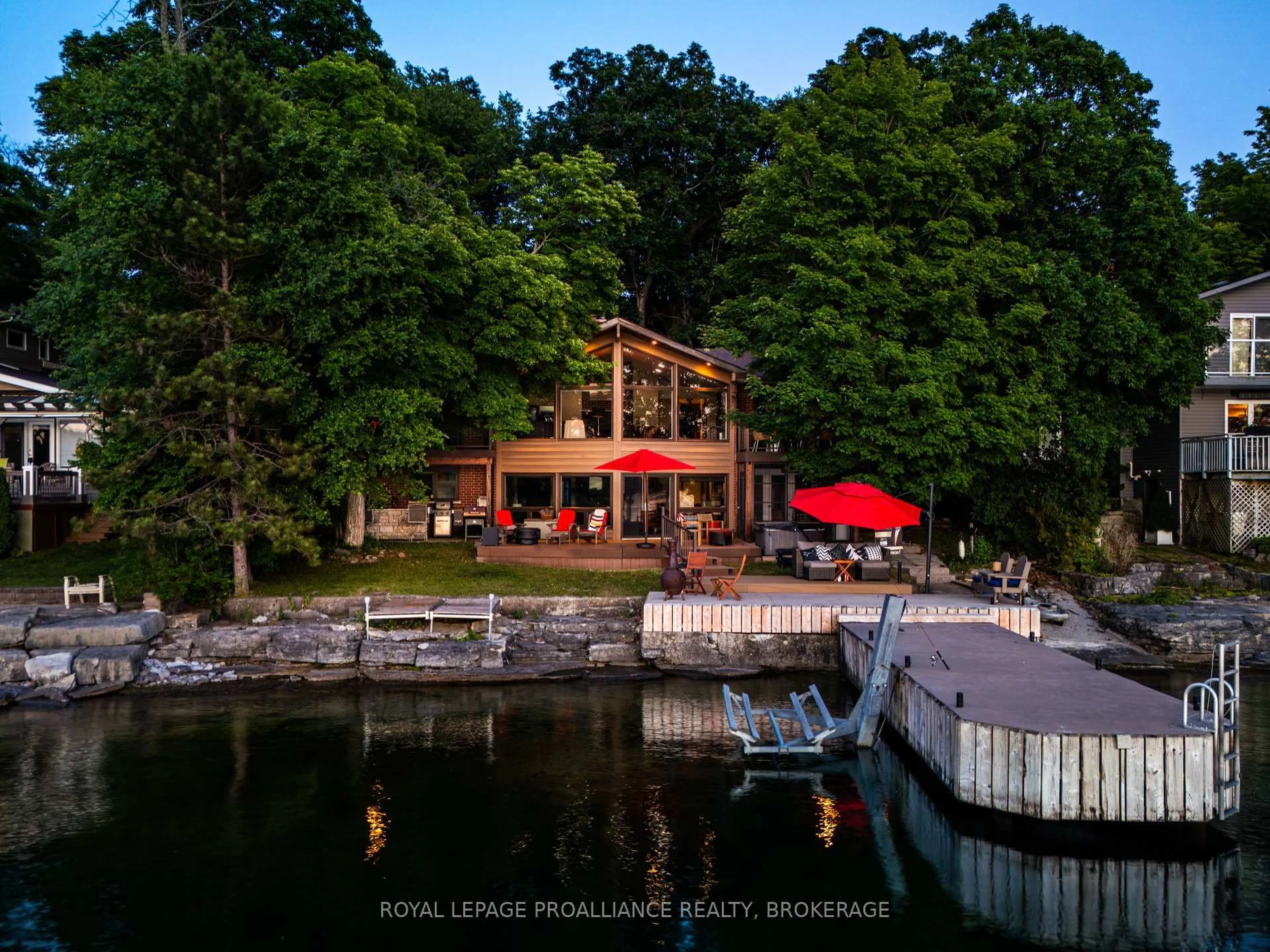 A pic from outside/outdoor area/front of a property/back of a property/a pic from drone, water/lake/river/ocean view for 306 Nicholson Point Rd, Bath Ontario K0H 1G0