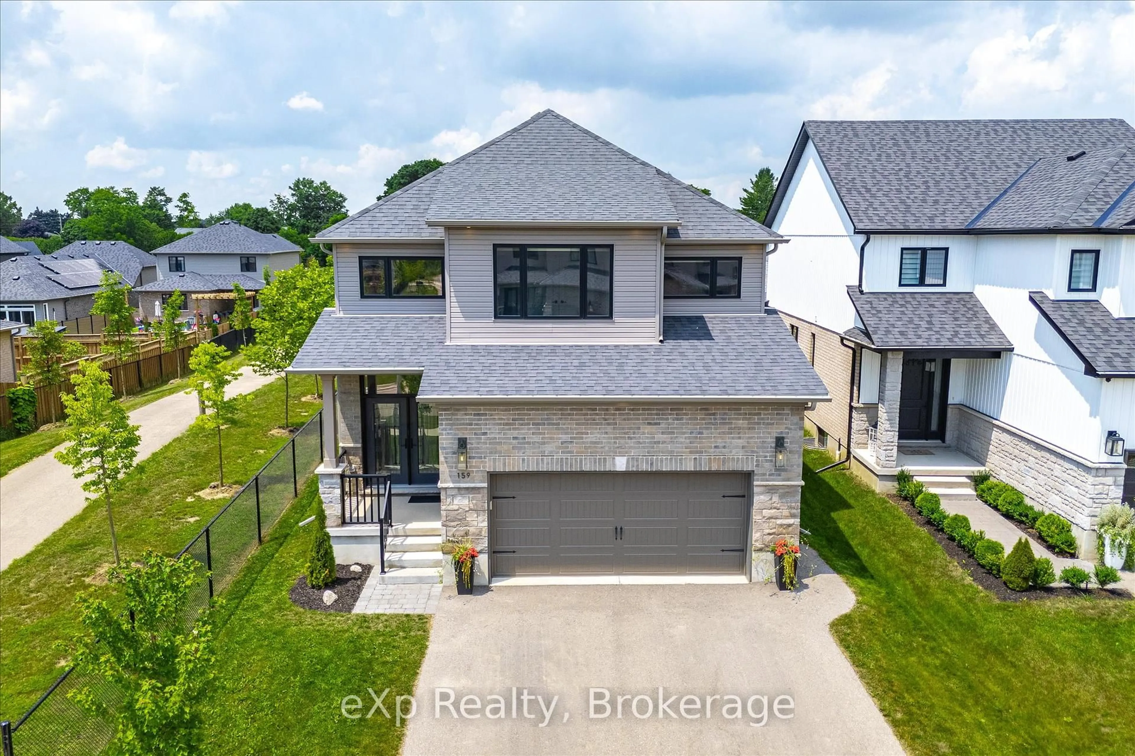 A pic from outside/outdoor area/front of a property/back of a property/a pic from drone, street for 159 Halls Dr, Centre Wellington Ontario N0B 1S0
