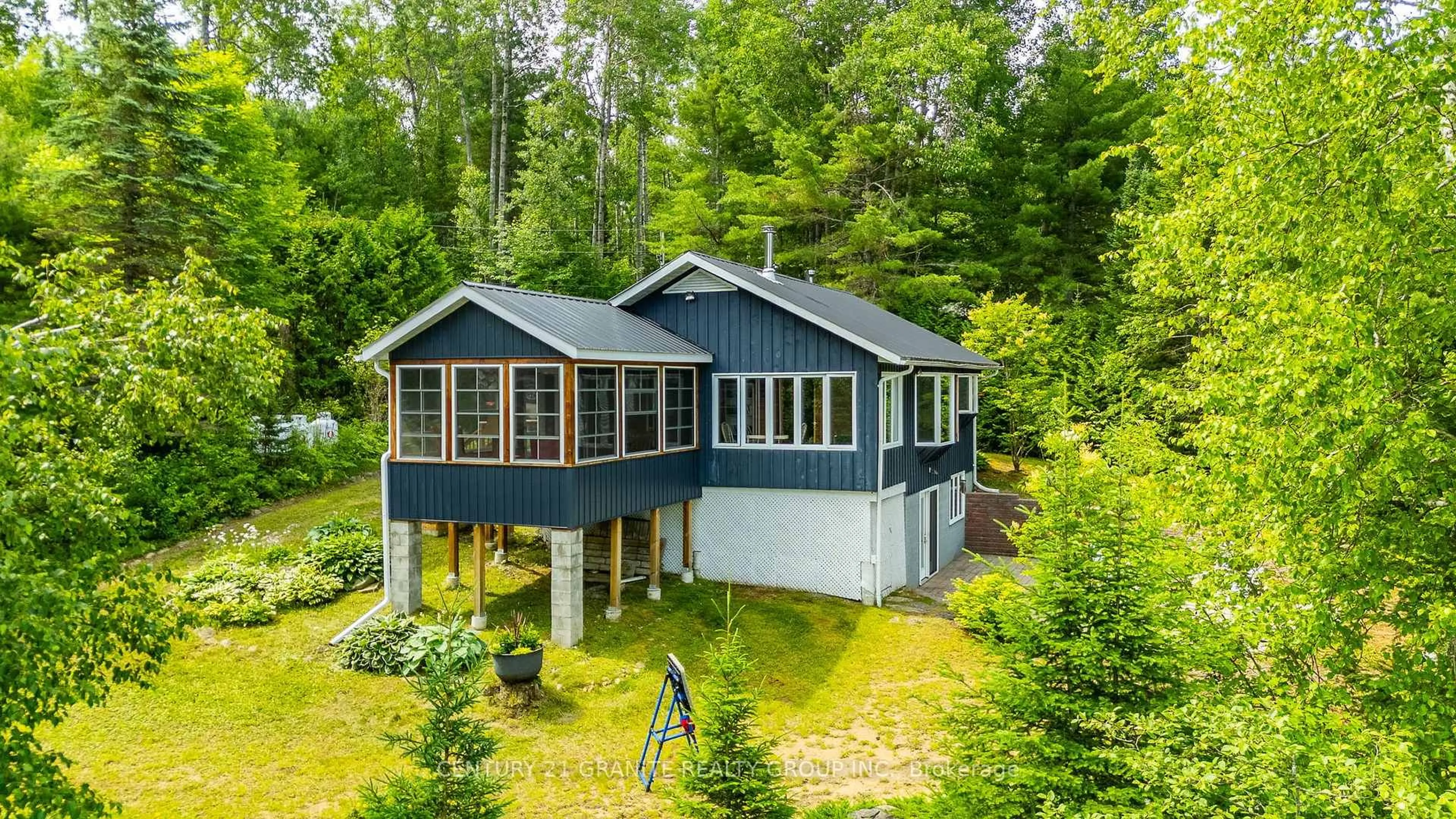 A pic from outside/outdoor area/front of a property/back of a property/a pic from drone, unknown for 928 Lake St Peter Rd, Maynooth Ontario K0L 2K0