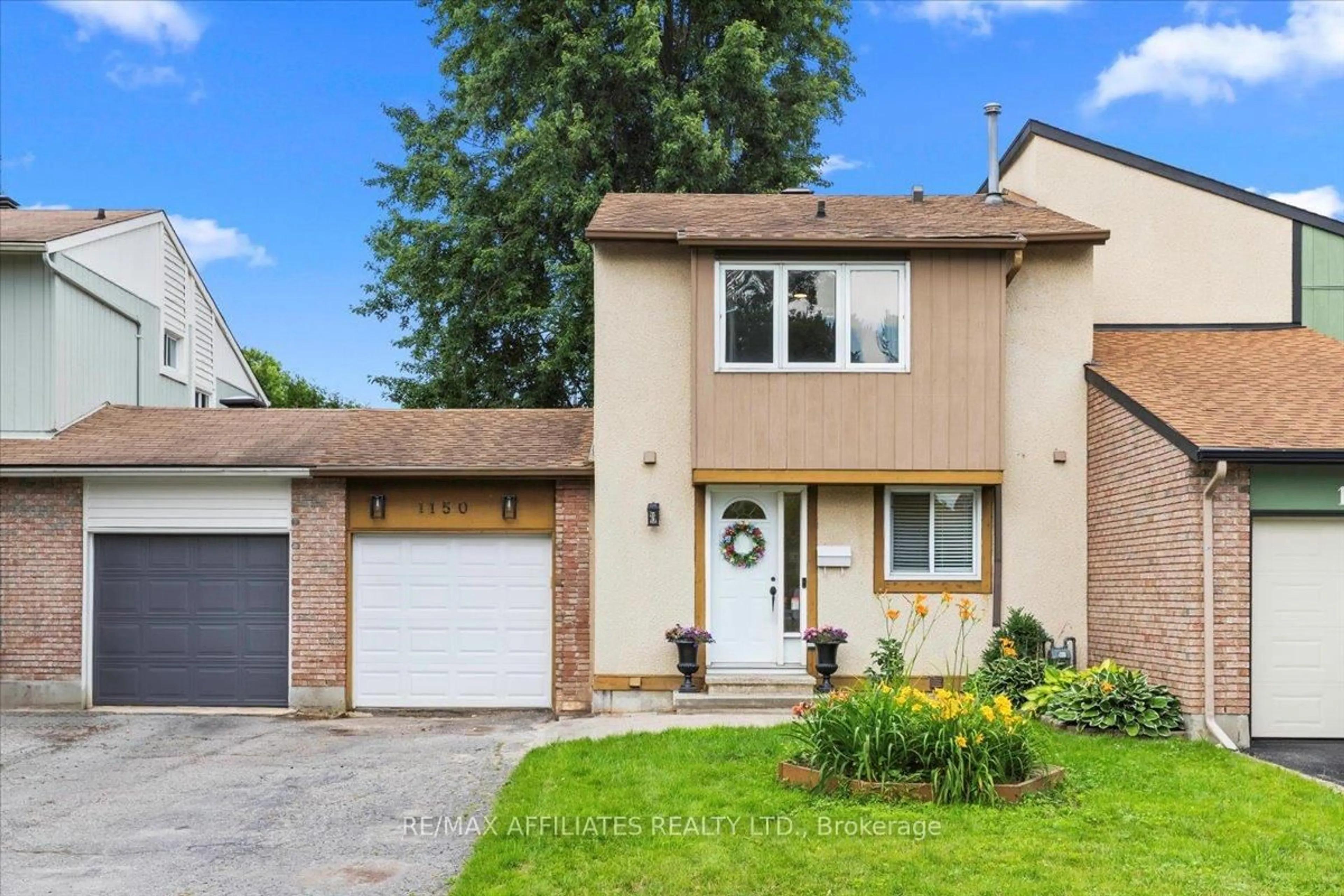 Home with vinyl exterior material, street for 1150 Grenoble Cres, Ottawa Ontario K1C 2C6