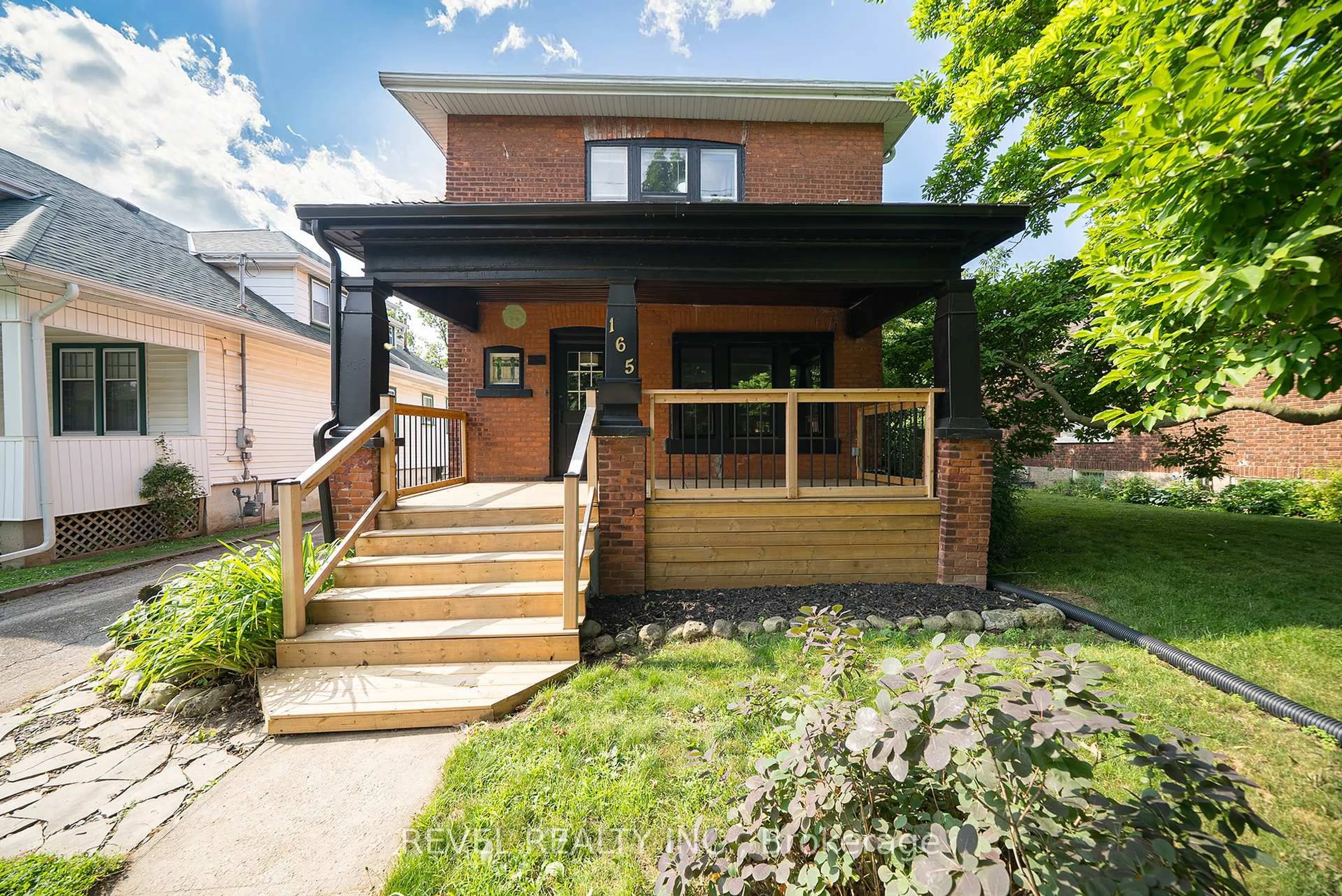 Home with brick exterior material, street for 165 East Ave, Brantford Ontario N3S 3M5