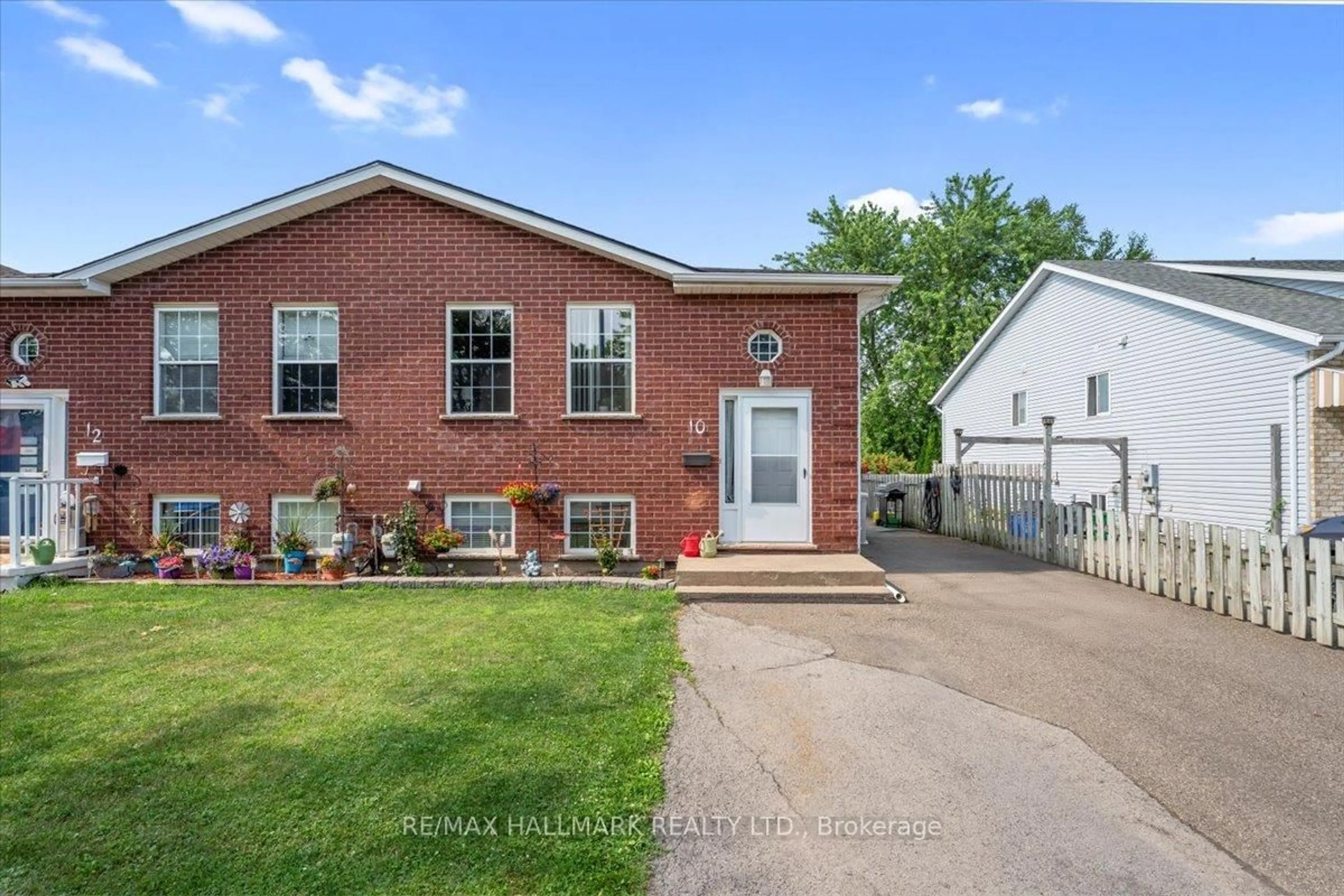 Home with brick exterior material, street for 10 Woodland Dr, Welland Ontario L3C 7C9