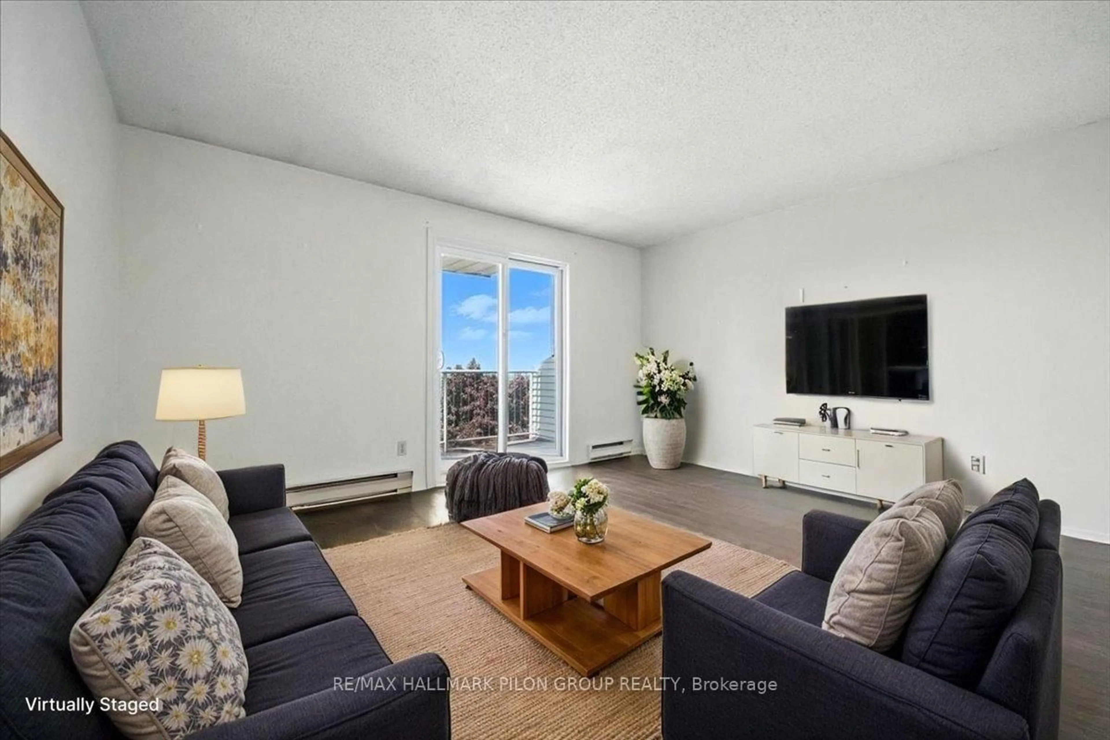 Living room with furniture, unknown for 270 Brittany Dr #411, Ottawa Ontario K1K 4M3