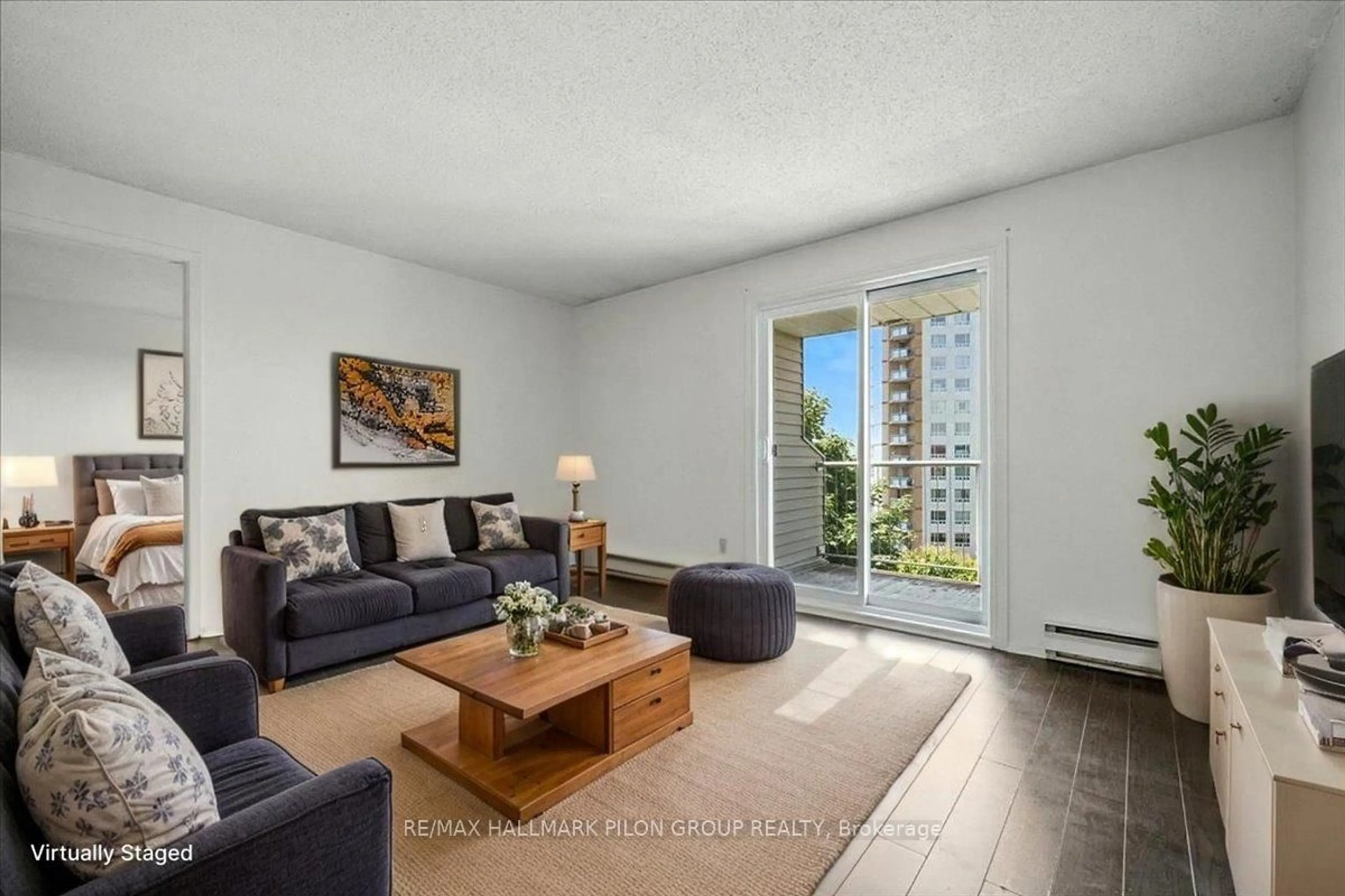 Living room with furniture, unknown for 270 Brittany Dr #411, Ottawa Ontario K1K 4M3