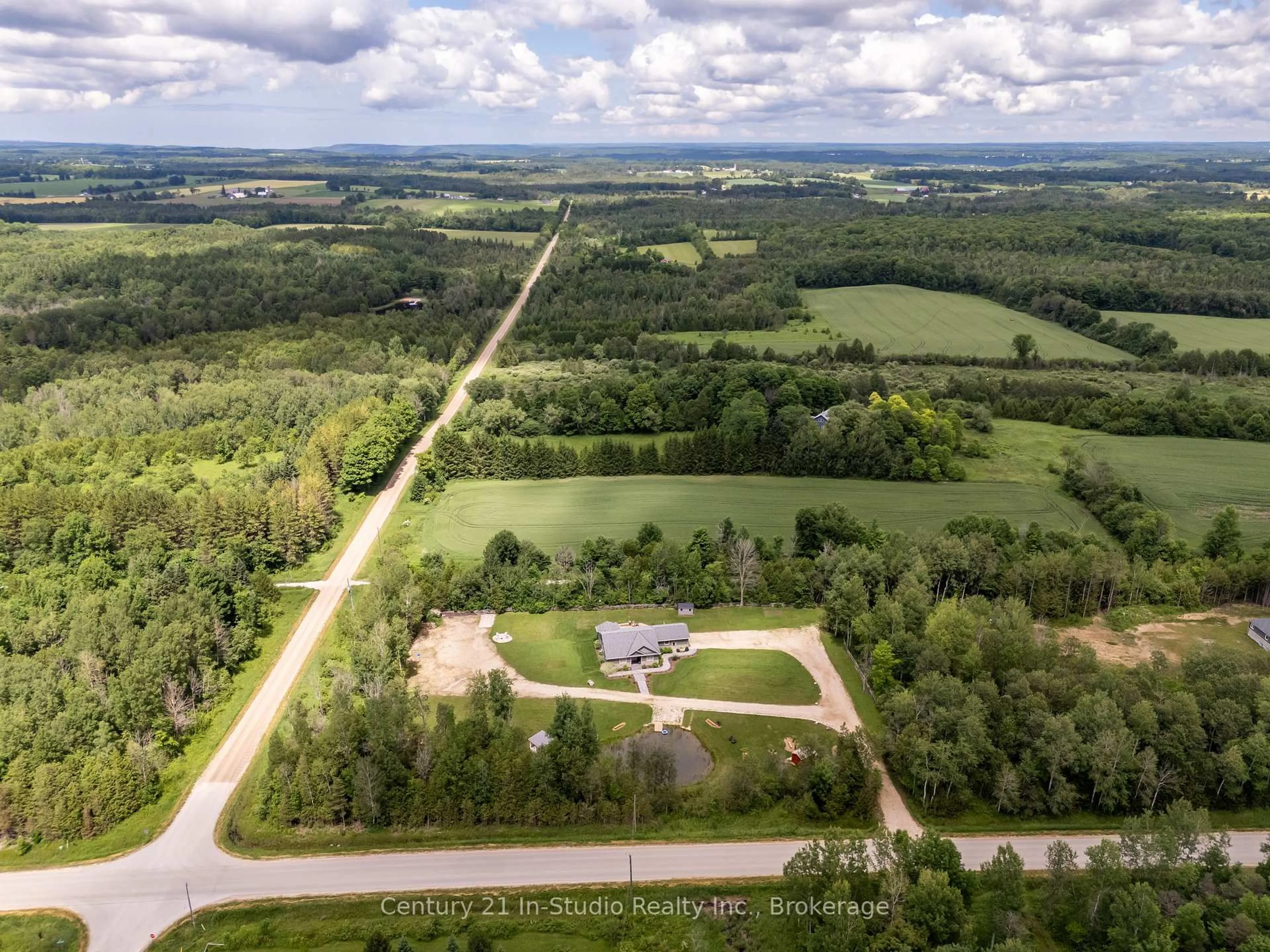 A pic from outside/outdoor area/front of a property/back of a property/a pic from drone, unknown for 734591 West Back Line, Grey Highlands Ontario N0C 1H0