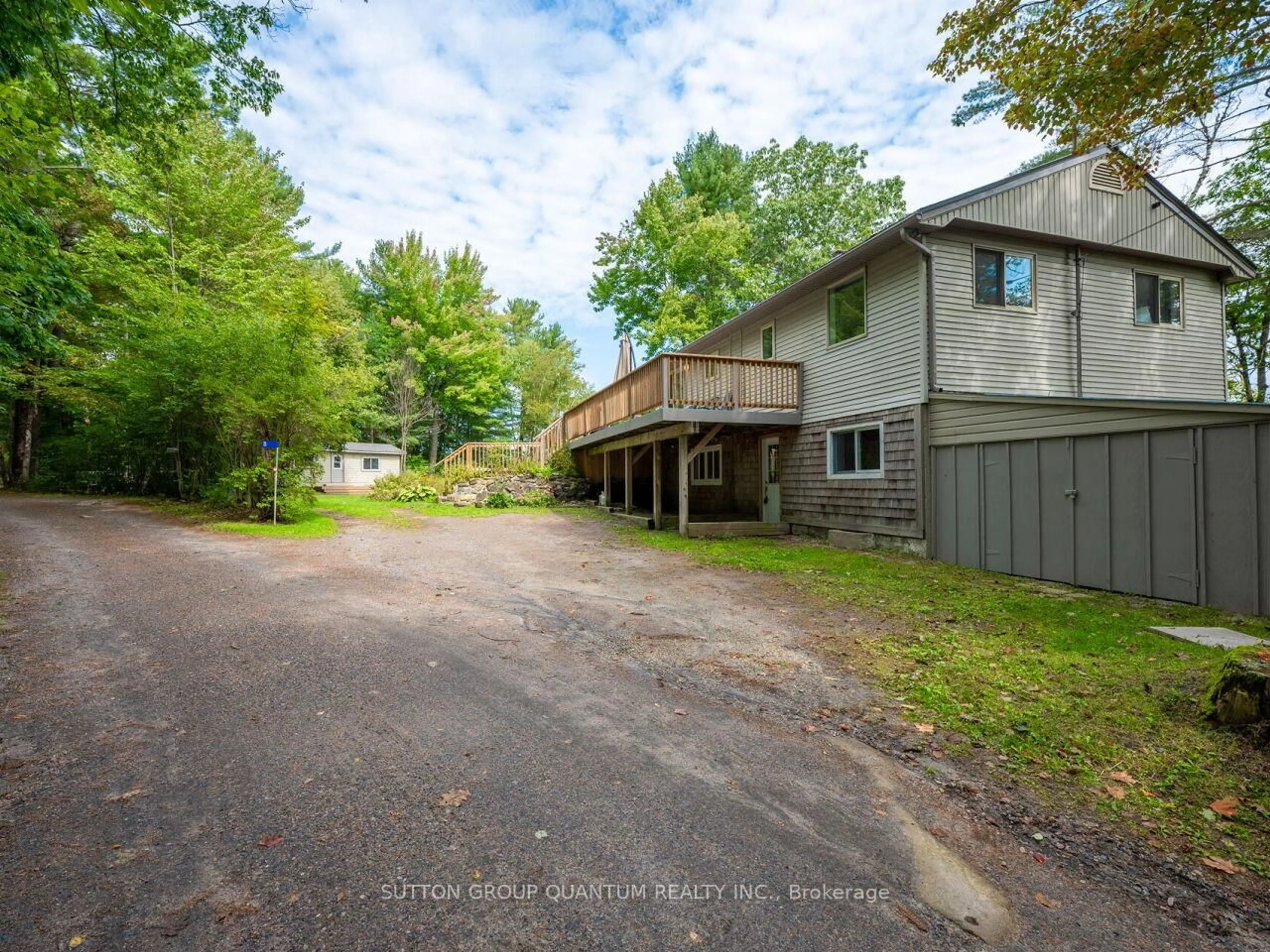 A pic from outside/outdoor area/front of a property/back of a property/a pic from drone, street for 1006 Youngs Rd ##8, Muskoka Lakes Ontario P0B 1J0