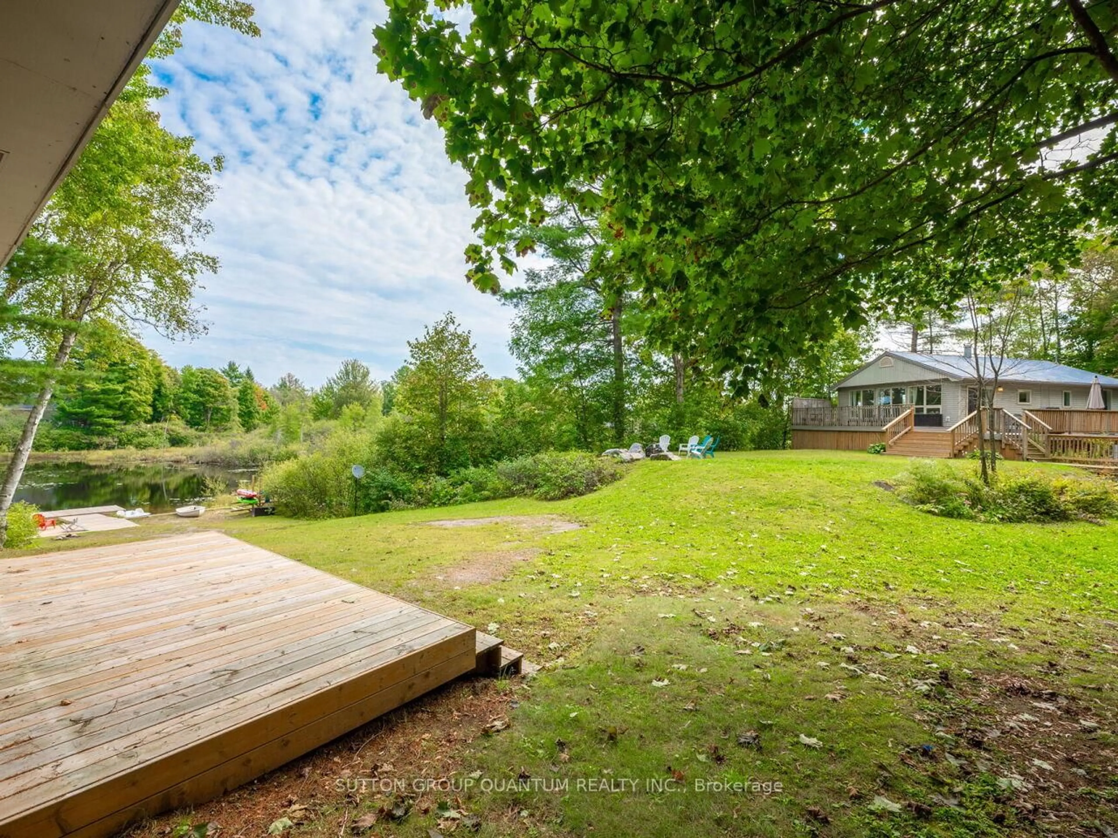 A pic from outside/outdoor area/front of a property/back of a property/a pic from drone, forest/trees view for 1006 Youngs Rd ##8, Muskoka Lakes Ontario P0B 1J0