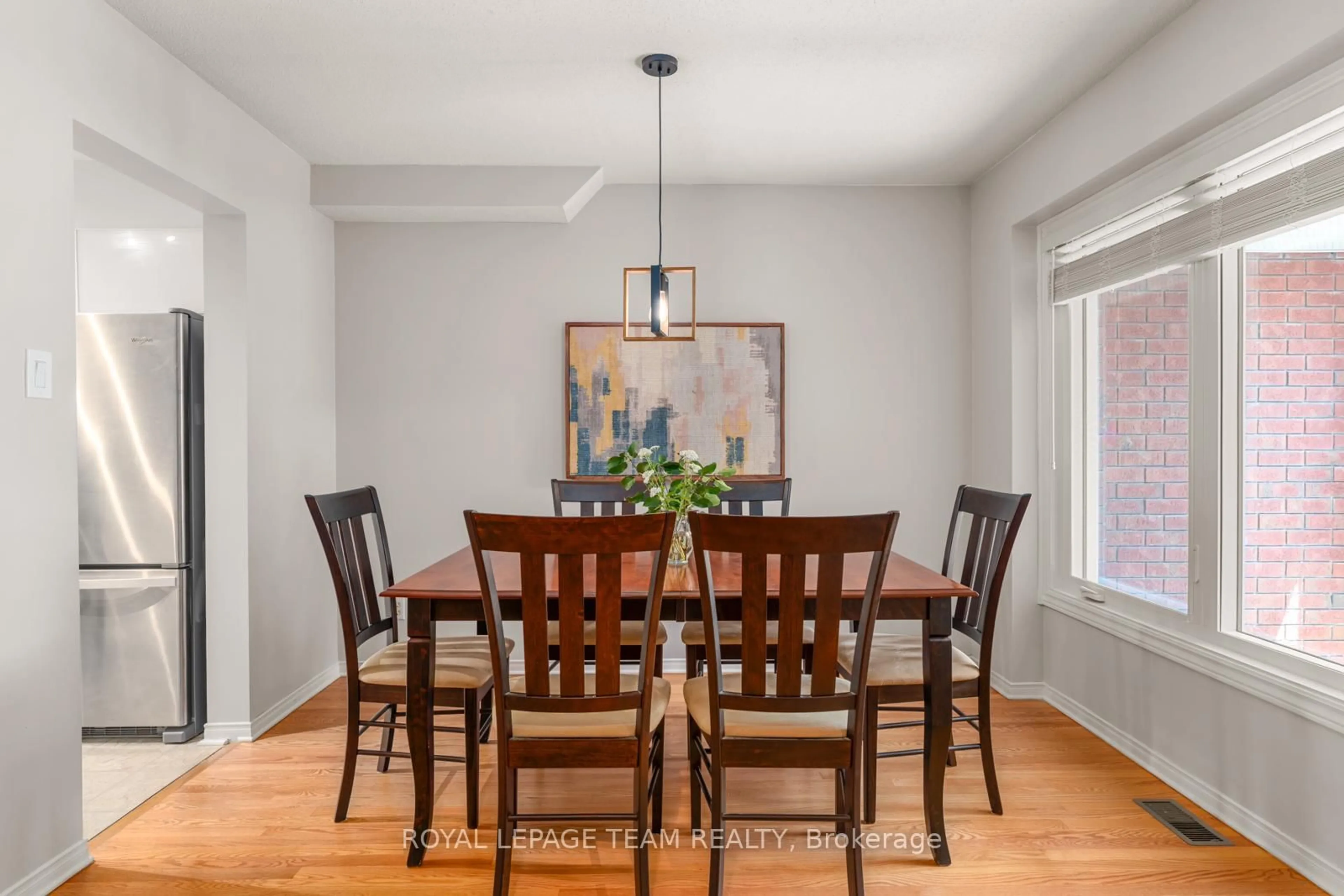 Dining room, wood/laminate floor for 3838 Crowsnest Ave, Ottawa Ontario K1V 1K4