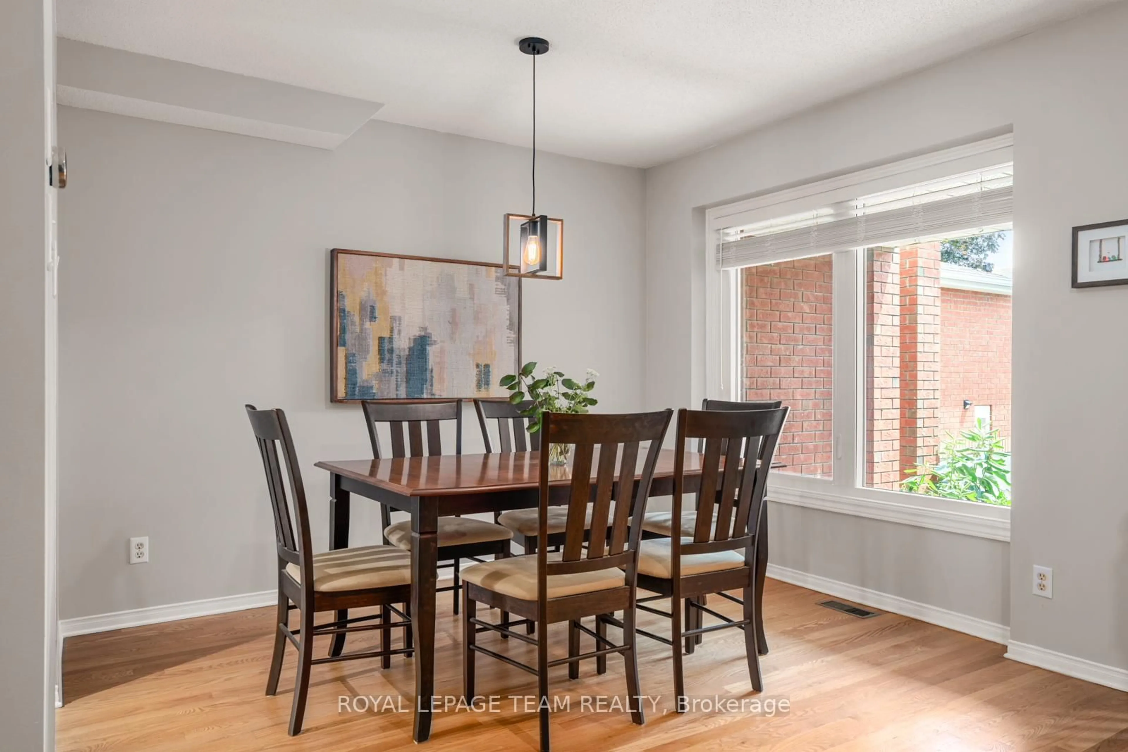 Dining room, wood/laminate floor for 3838 Crowsnest Ave, Ottawa Ontario K1V 1K4