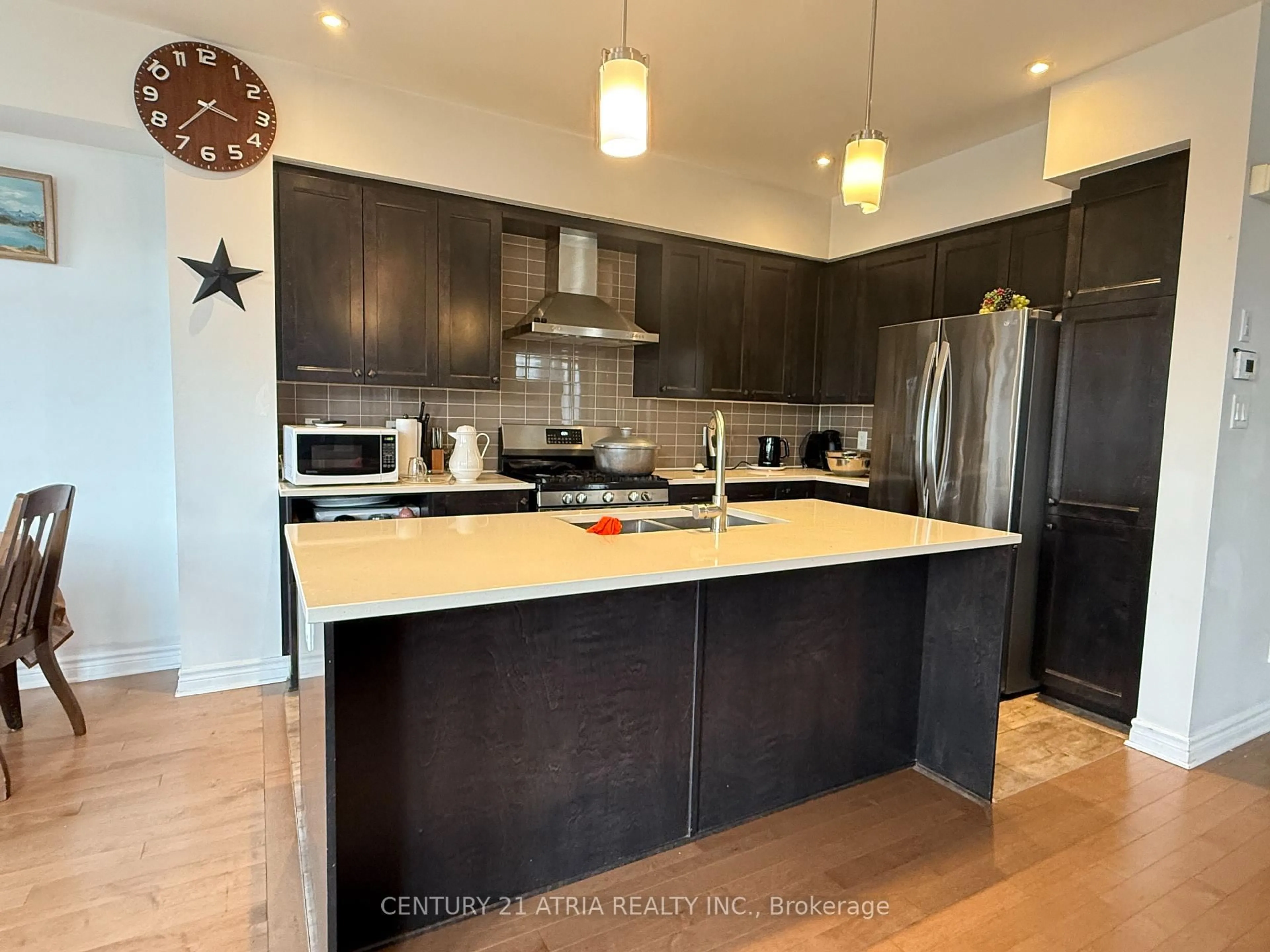Open concept kitchen, wood/laminate floor for 534 Triangle St, Ottawa Ontario K2S 1E7