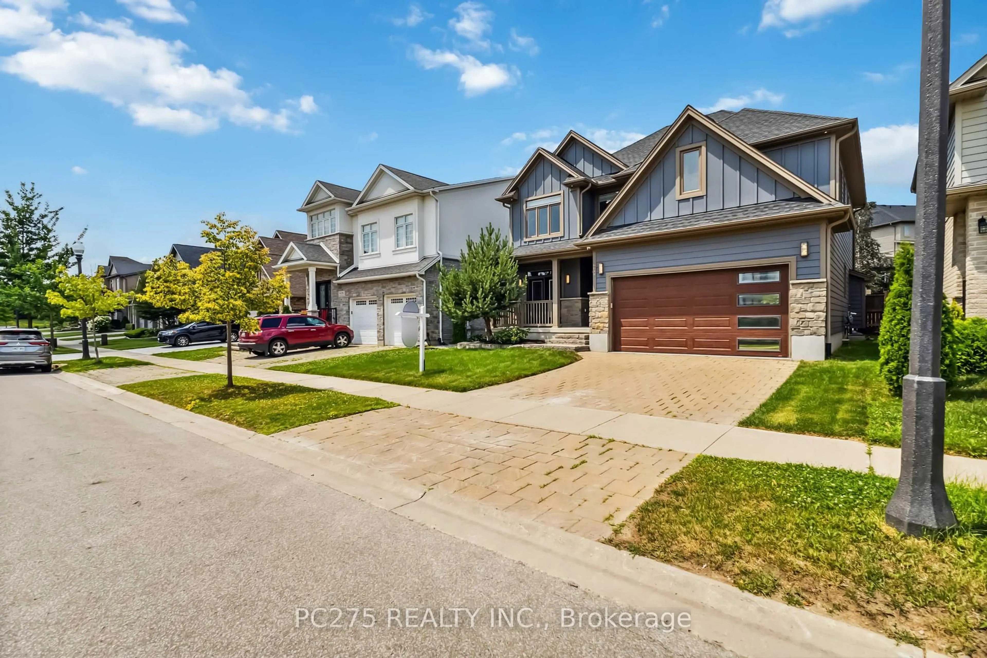 A pic from outside/outdoor area/front of a property/back of a property/a pic from drone, street for 6688 Raleigh Blvd, London South Ontario N6P 0C1
