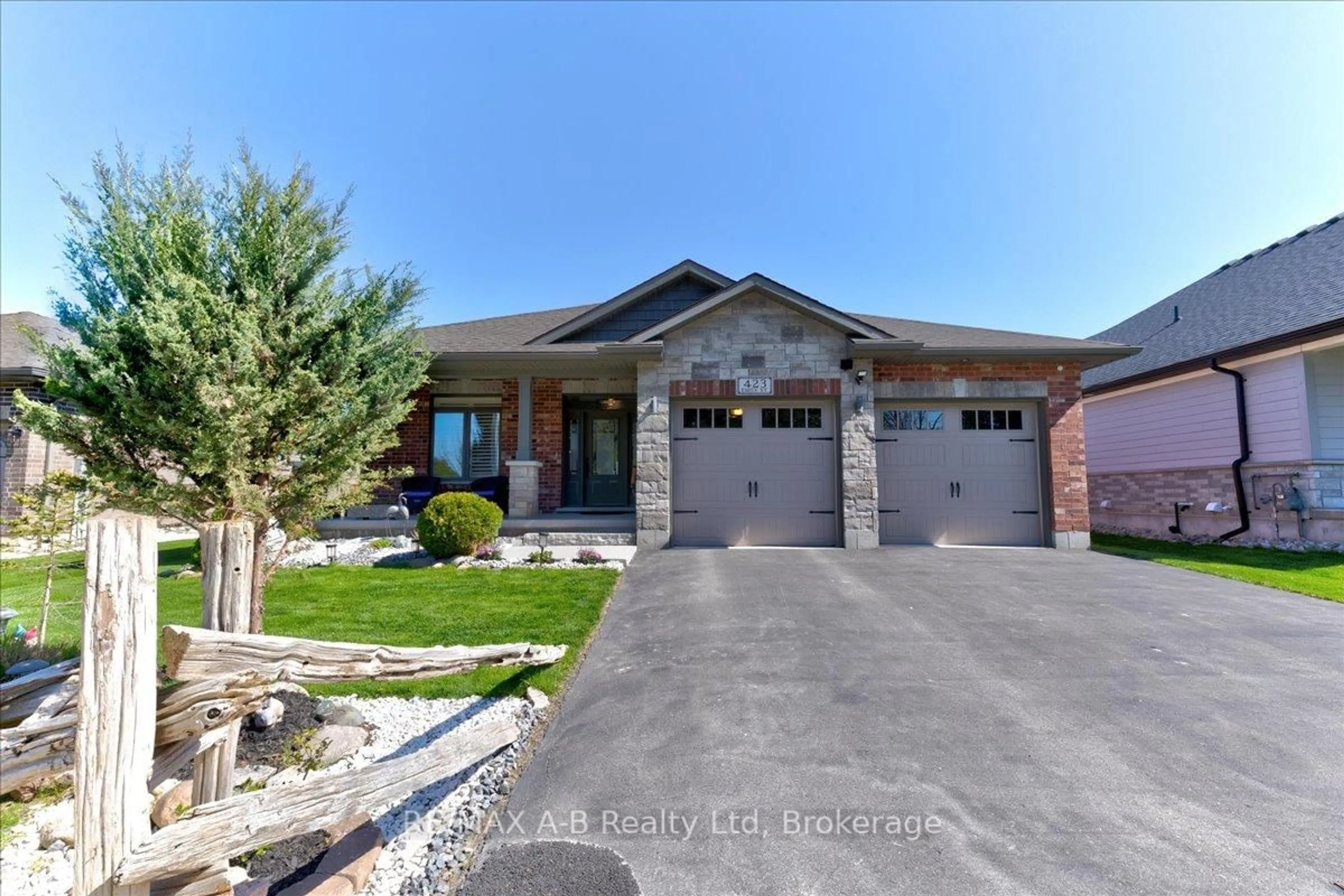 Home with brick exterior material, street for 423 Emily St, St. Marys Ontario N4X 0B7