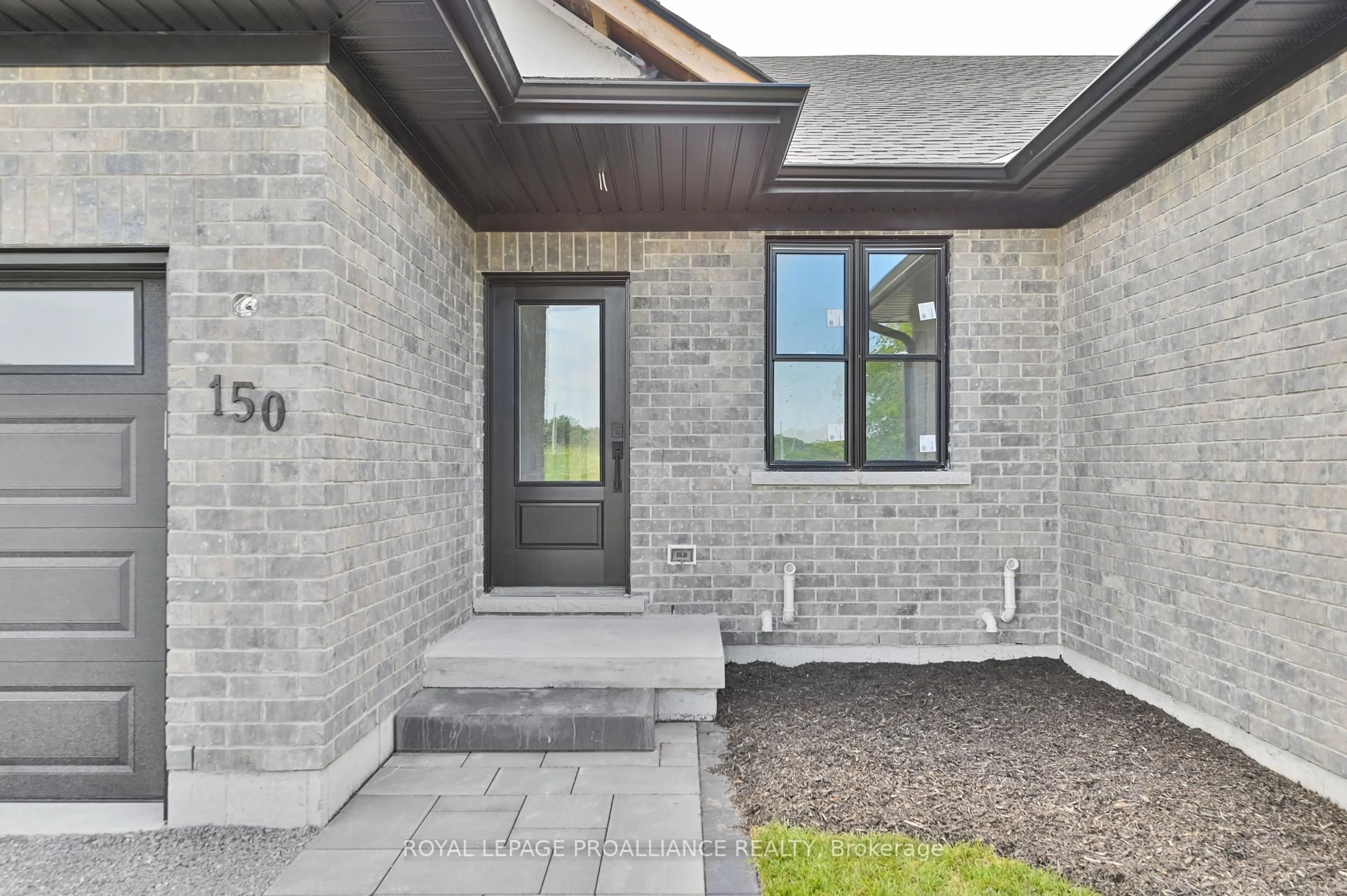 Home with brick exterior material, street for 150 John St, Stirling Ontario K0K 3E0